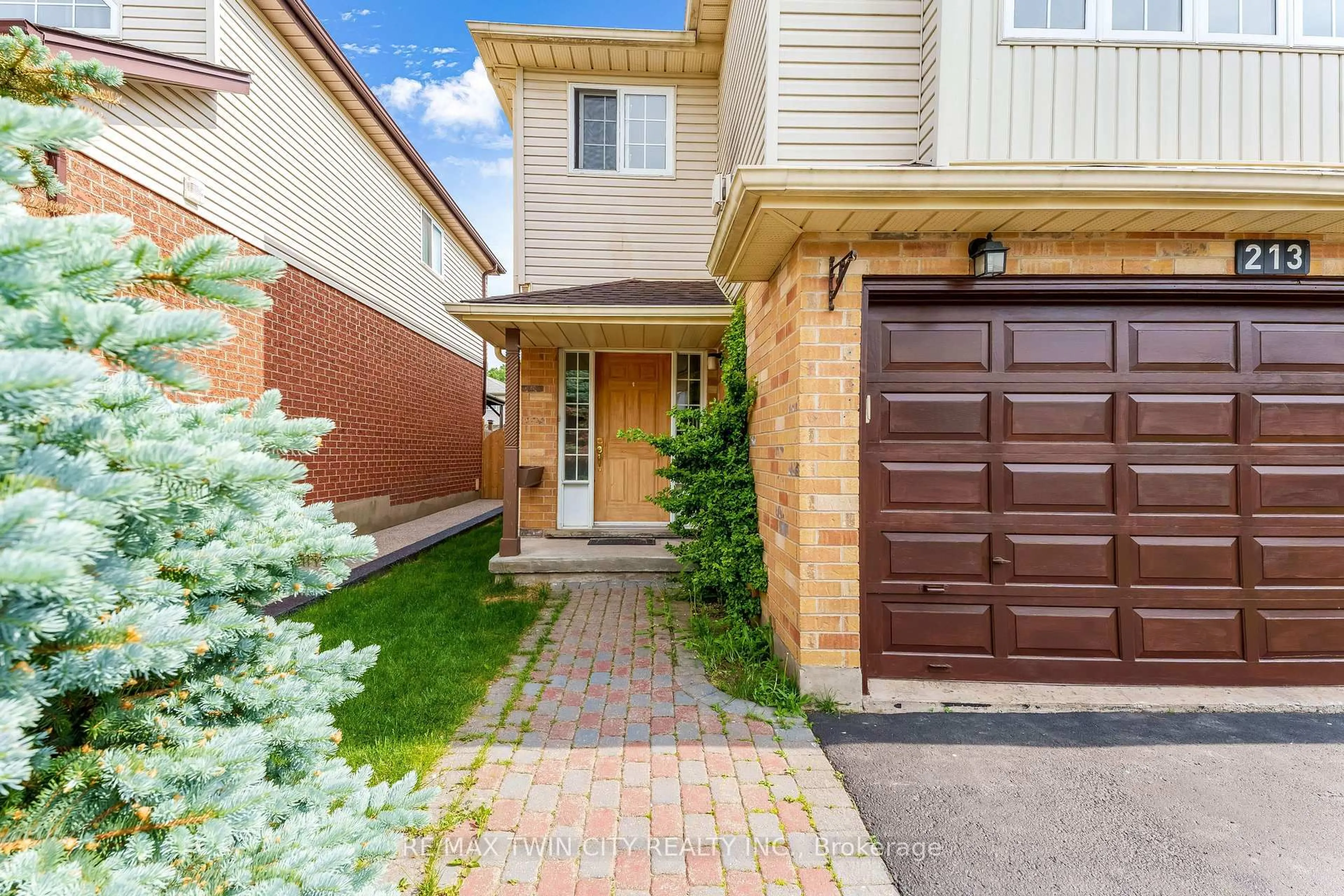 Home with brick exterior material, street for 213 Grey Fox Dr, Kitchener Ontario N2E 3N7