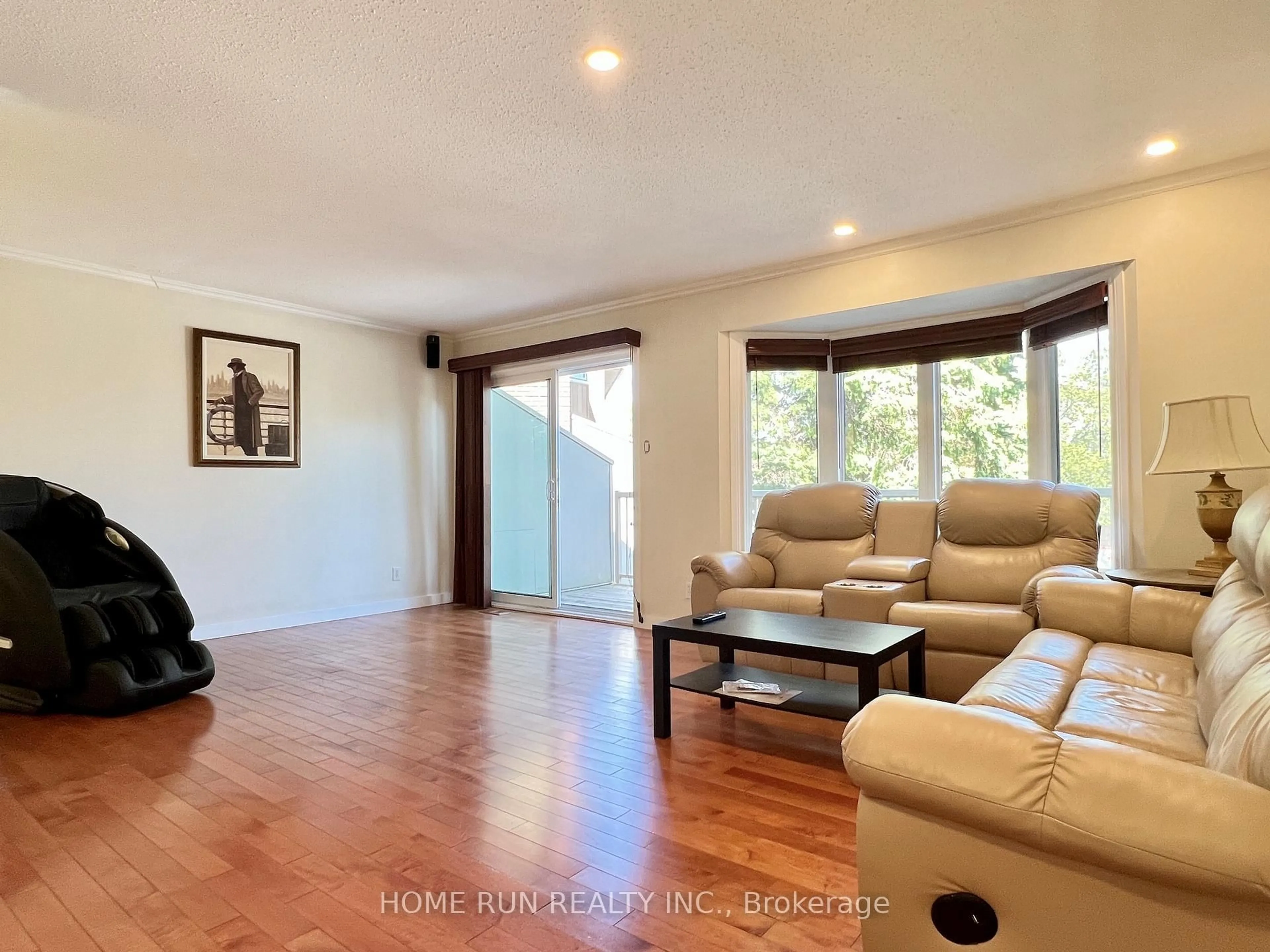 Living room with furniture, wood/laminate floor for 76 winbro Private, Ottawa Ontario K1V 0M6