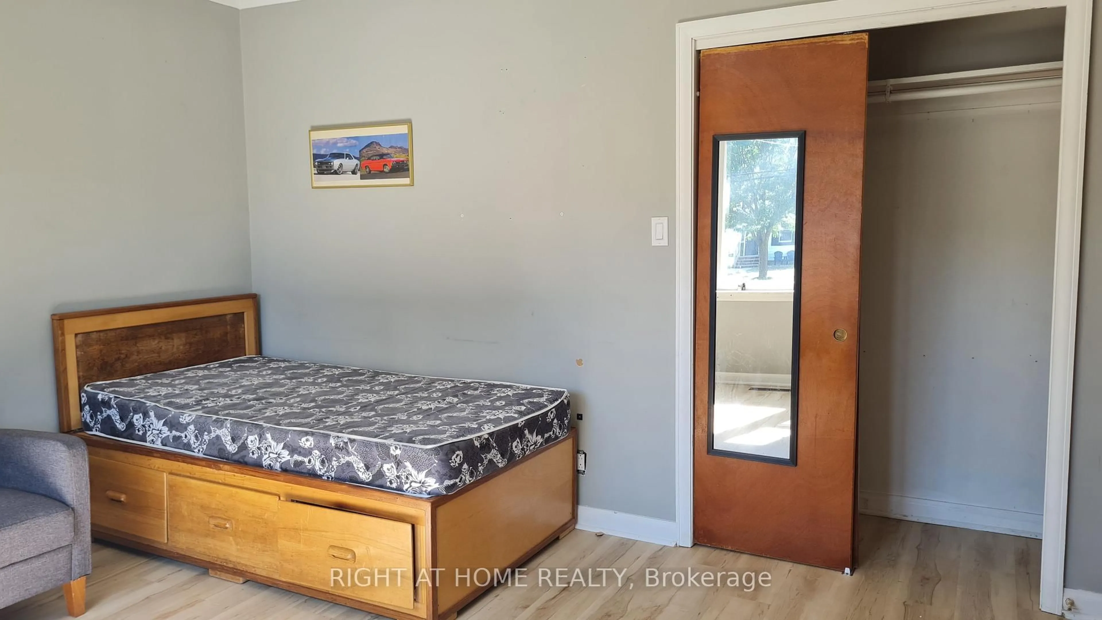Bedroom with bed, wood/laminate floor for 310 Grey St, London East Ontario N6B 1G6