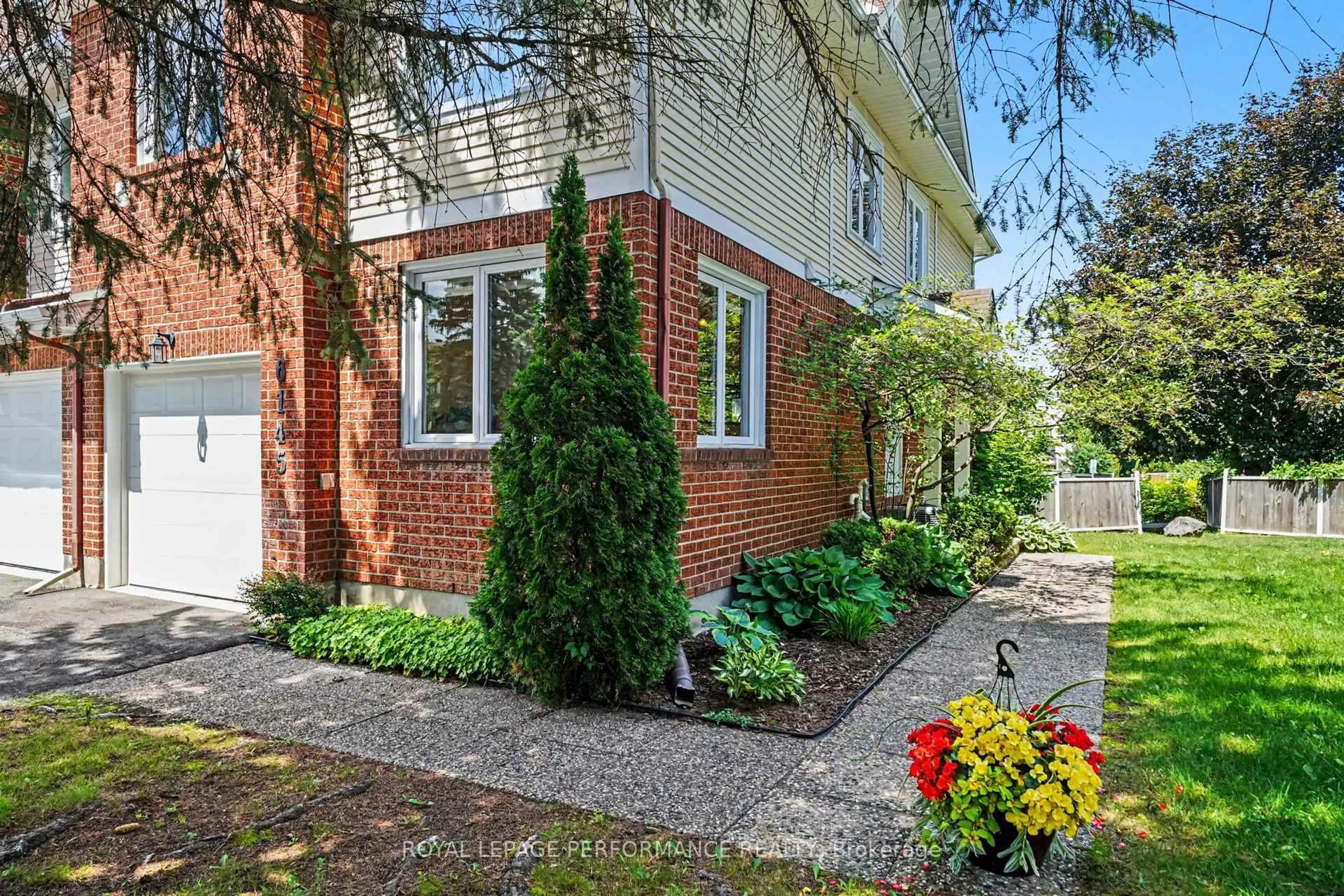 Home with brick exterior material, street for 6145 Oak Meadows Dr, Ottawa Ontario K1C 7G7