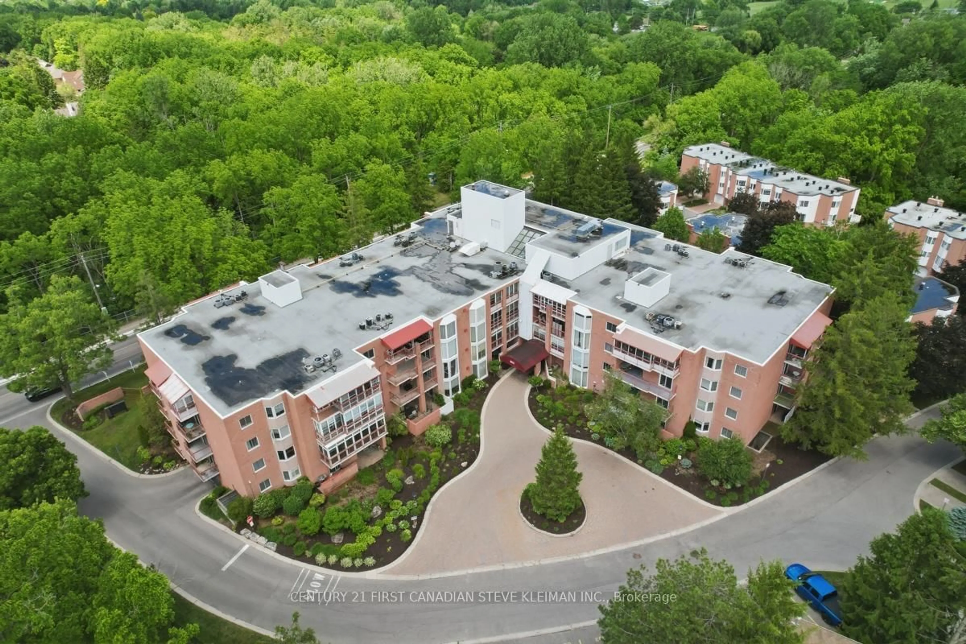 A pic from outside/outdoor area/front of a property/back of a property/a pic from drone, city buildings view from balcony for 693 Windermere Rd #309, London North Ontario N5X 2P1