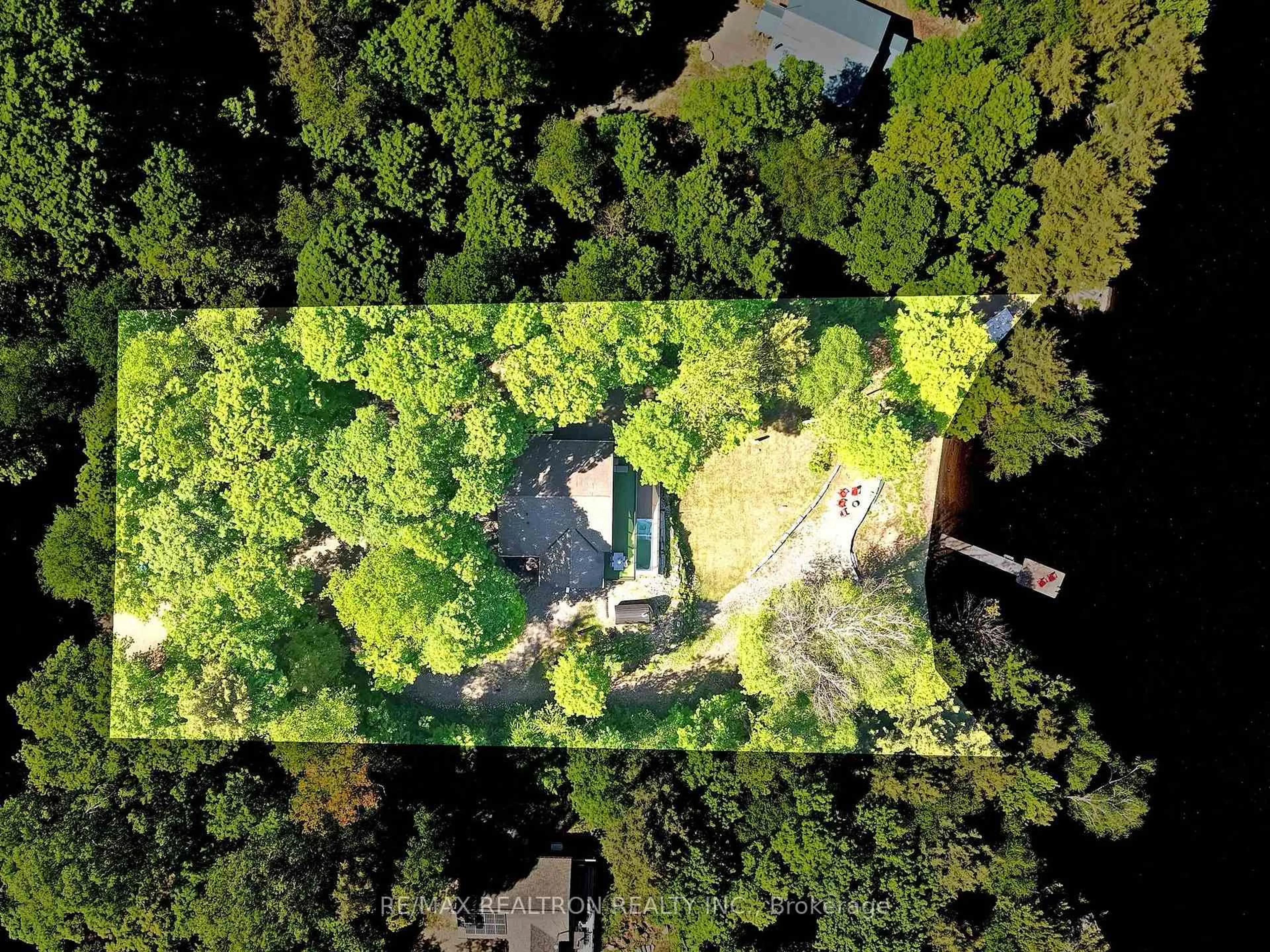 A pic from outside/outdoor area/front of a property/back of a property/a pic from drone, forest/trees view for 1575 Rugged Lane, Minden Hills Ontario K0M 2K0
