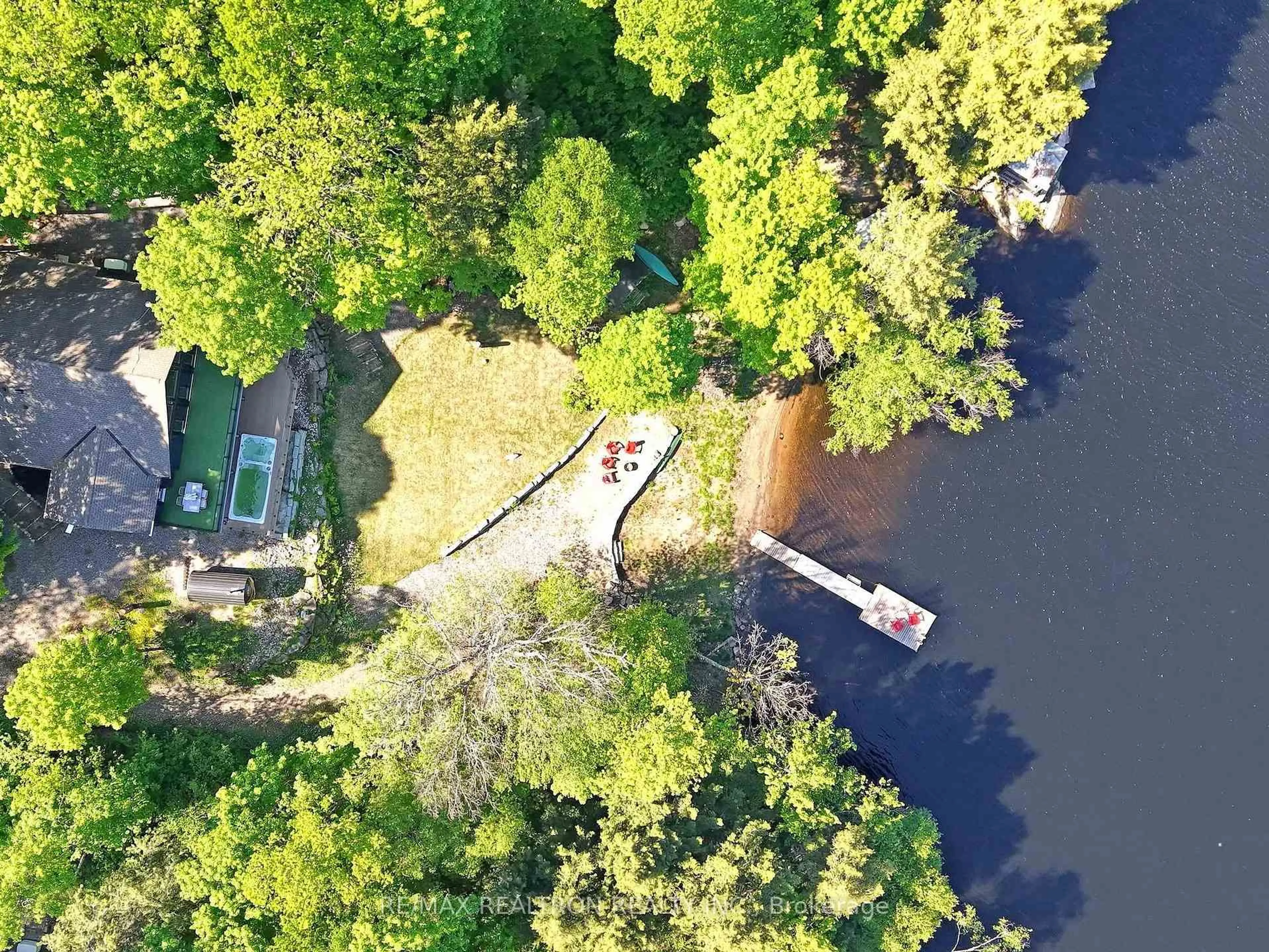 A pic from outside/outdoor area/front of a property/back of a property/a pic from drone, water/lake/river/ocean view for 1575 Rugged Lane, Minden Hills Ontario K0M 2K0