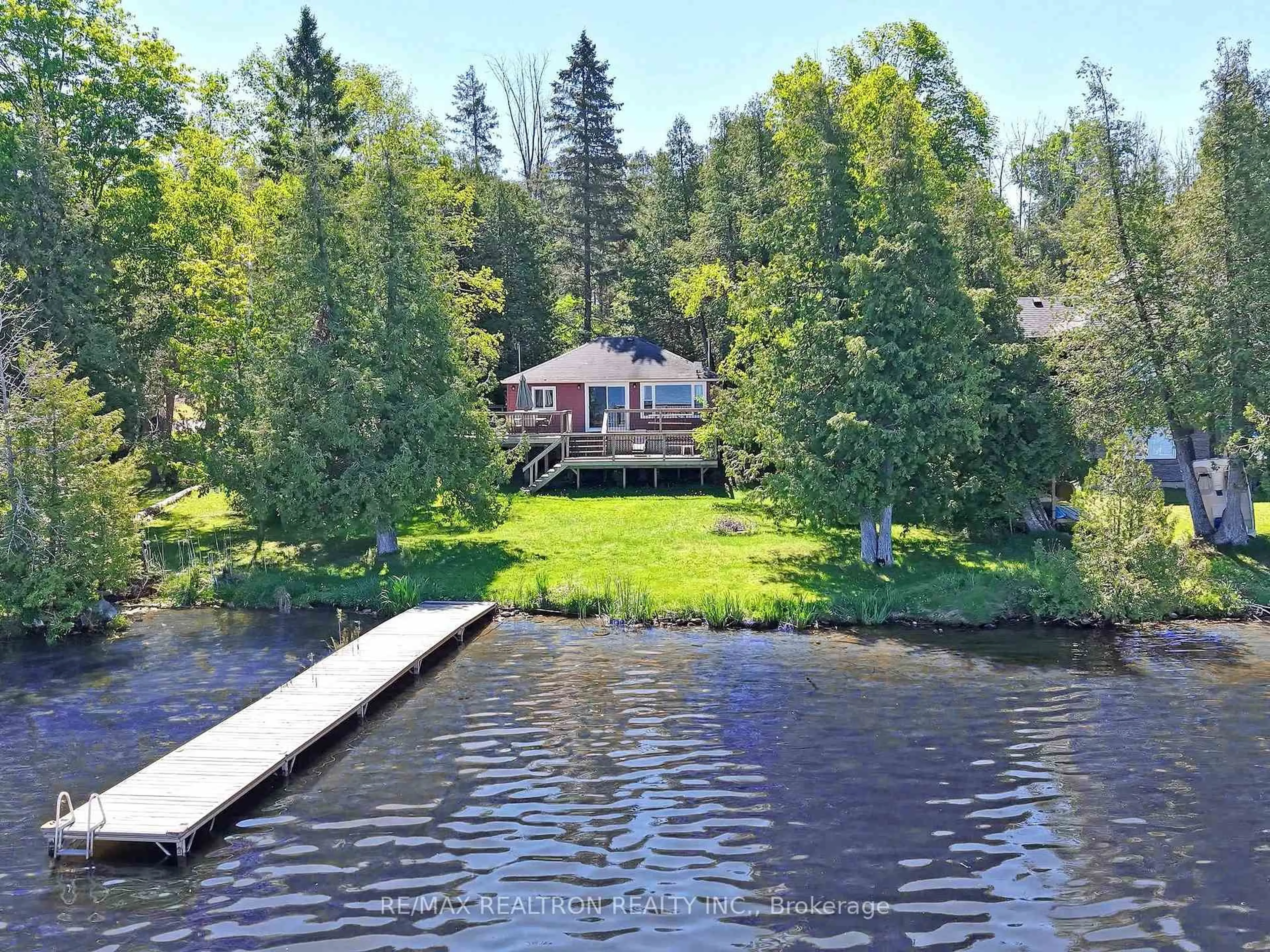 A pic from outside/outdoor area/front of a property/back of a property/a pic from drone, water/lake/river/ocean view for 58 Iris Dr, Kawartha Lakes Ontario K0M 1G0