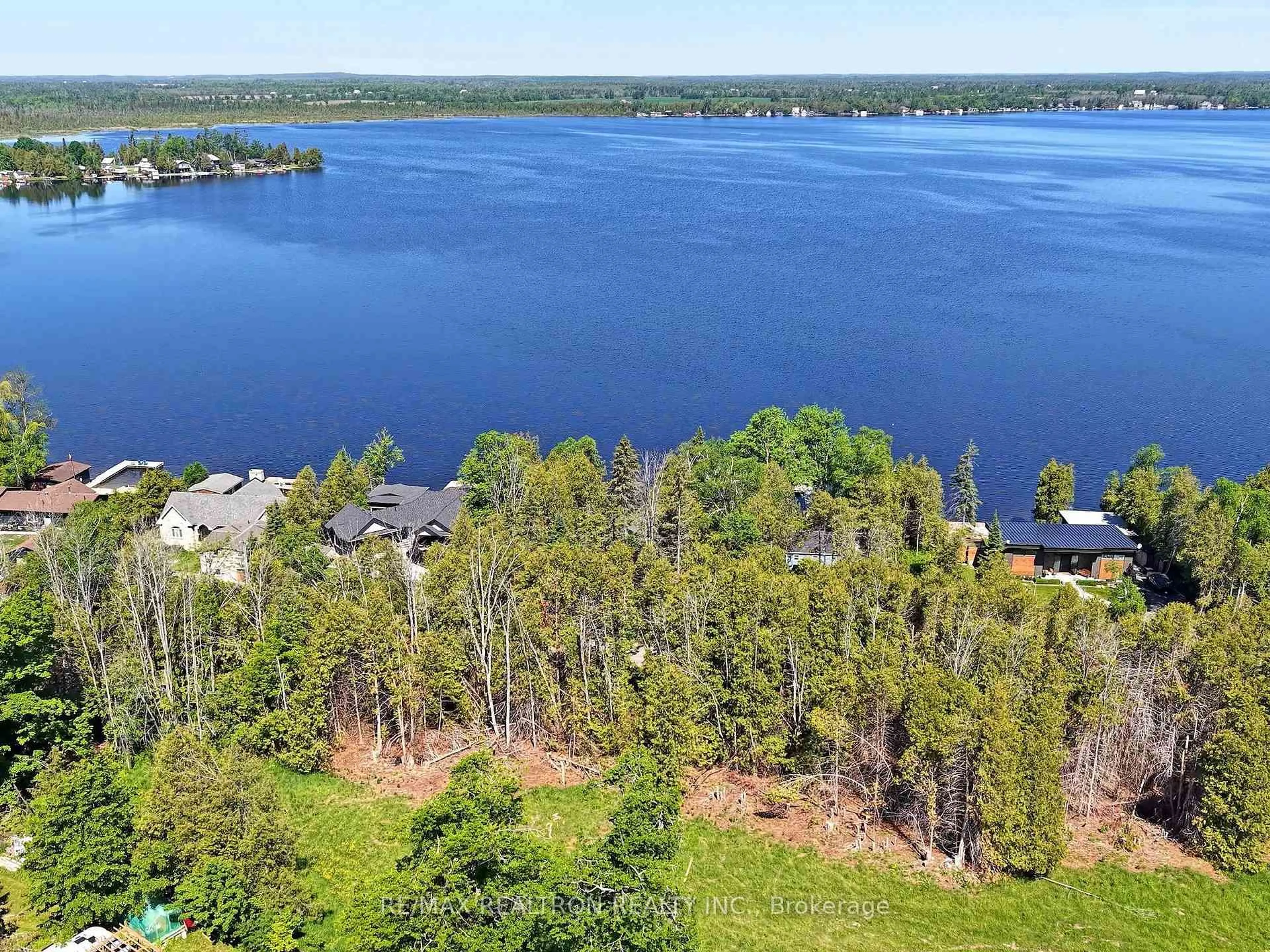 A pic from outside/outdoor area/front of a property/back of a property/a pic from drone, water/lake/river/ocean view for 58 Iris Dr, Kawartha Lakes Ontario K0M 1G0