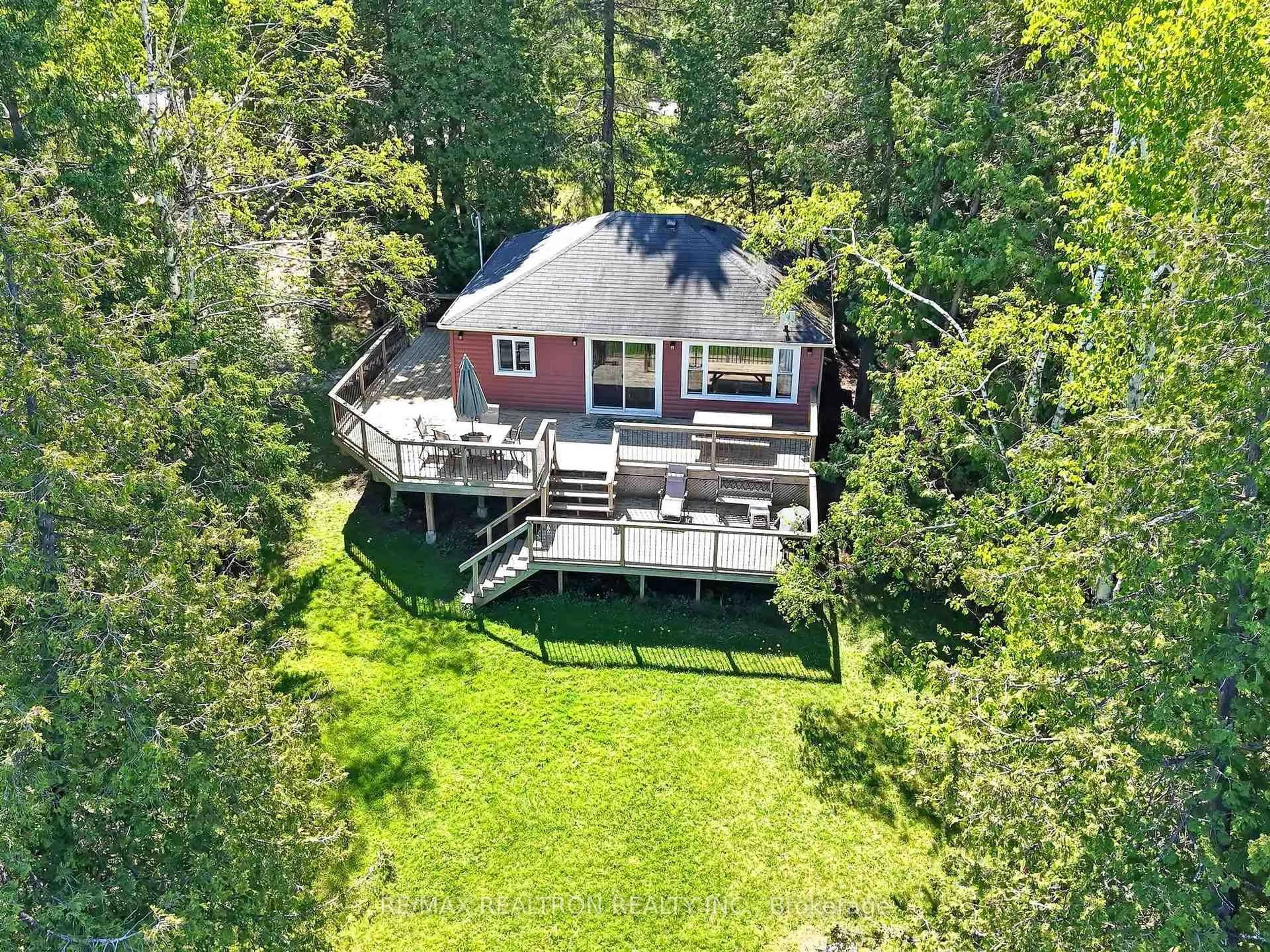 A pic from outside/outdoor area/front of a property/back of a property/a pic from drone, water/lake/river/ocean view for 58 Iris Dr, Kawartha Lakes Ontario K0M 1G0