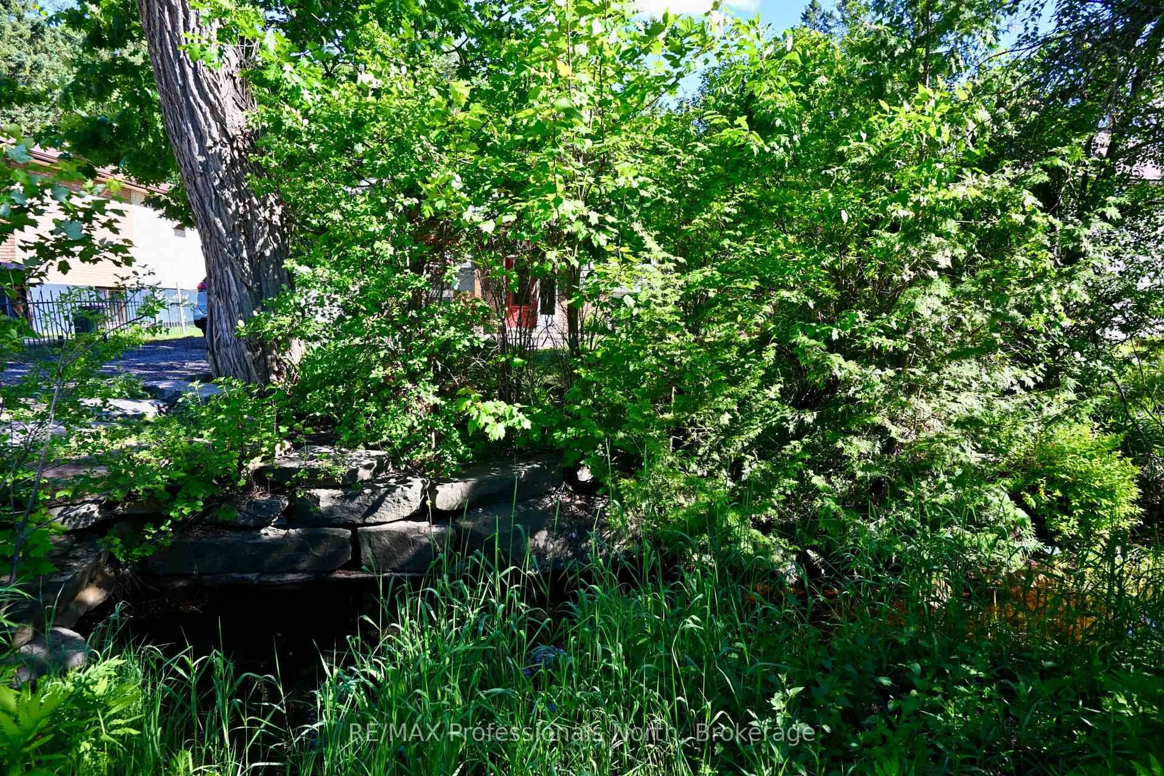 Patio, forest/trees view for 77 Hanes Rd, Huntsville Ontario P1H 1M3