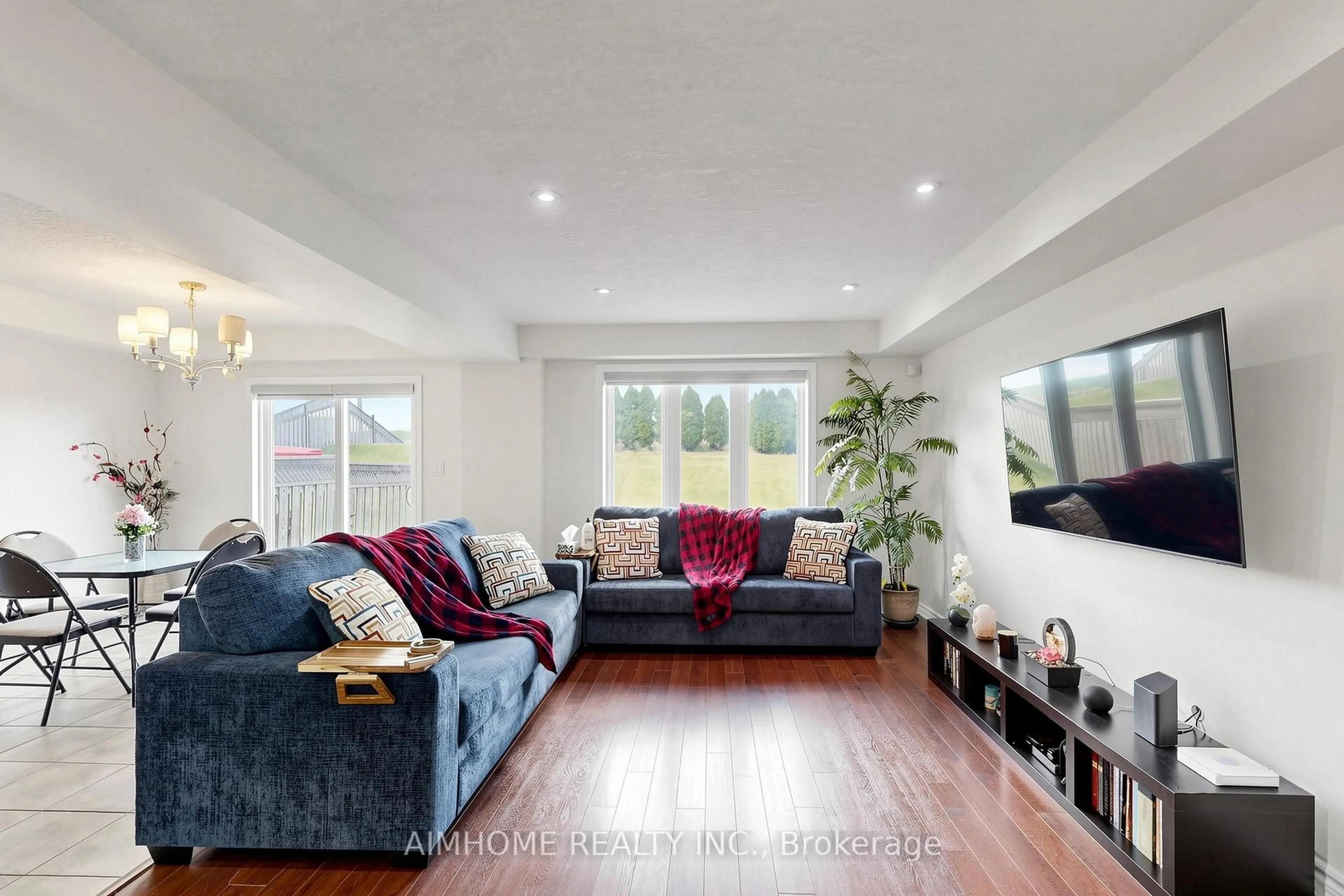 Living room with furniture, wood/laminate floor for 205 Huck Cres, Kitchener Ontario N2N 0A3