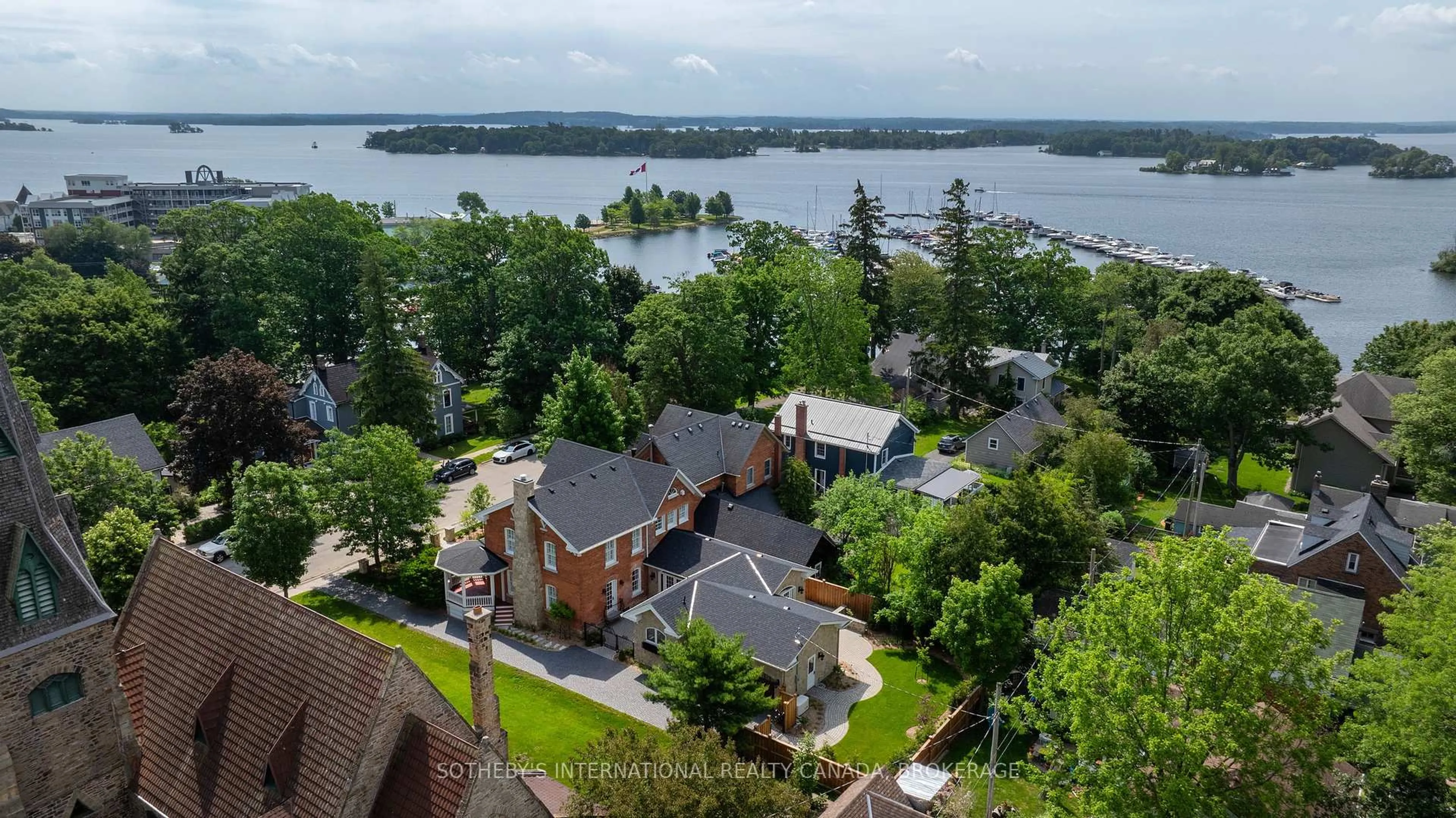 A pic from outside/outdoor area/front of a property/back of a property/a pic from drone, water/lake/river/ocean view for 40 Church St, Gananoque Ontario K7G 2M8