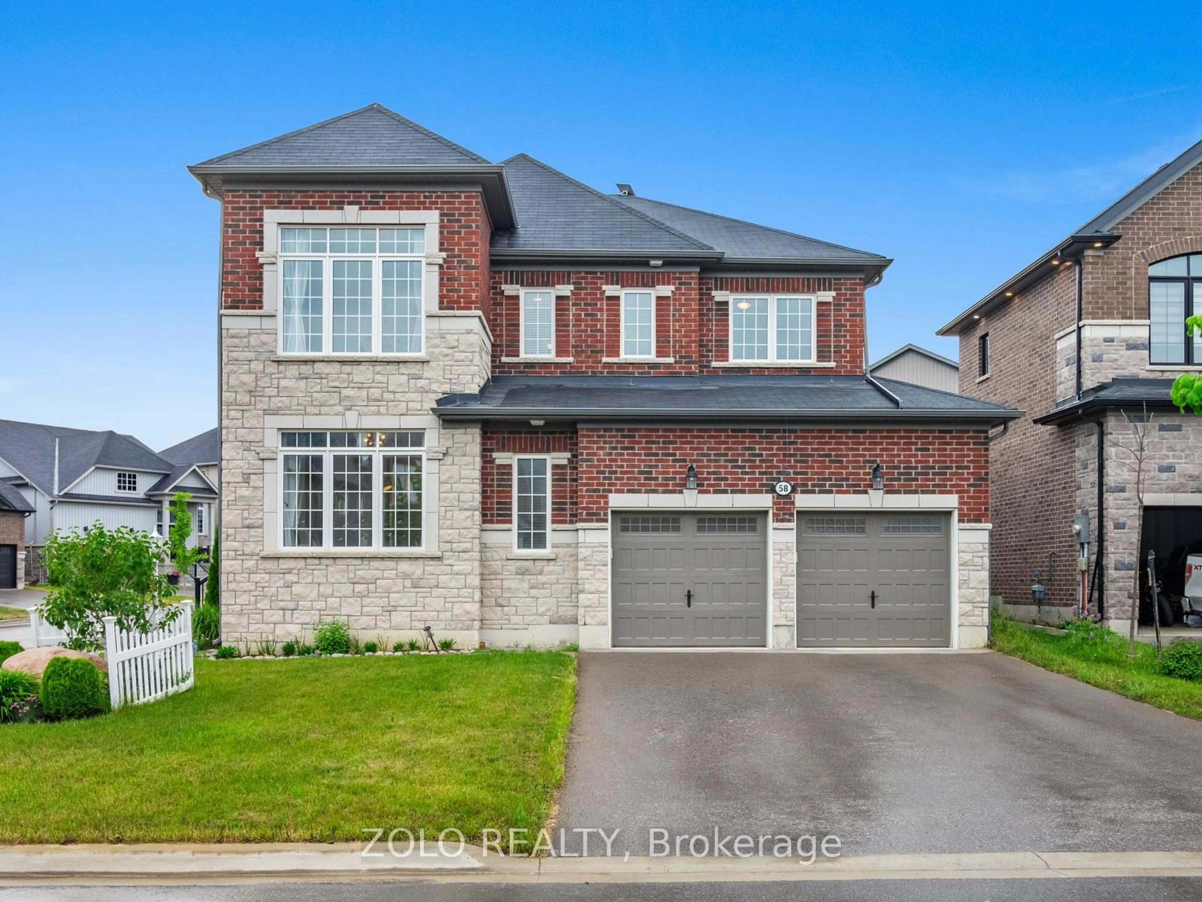 Home with brick exterior material, street for 58 Highlands Blvd, Cavan Monaghan Ontario L0A 1G0