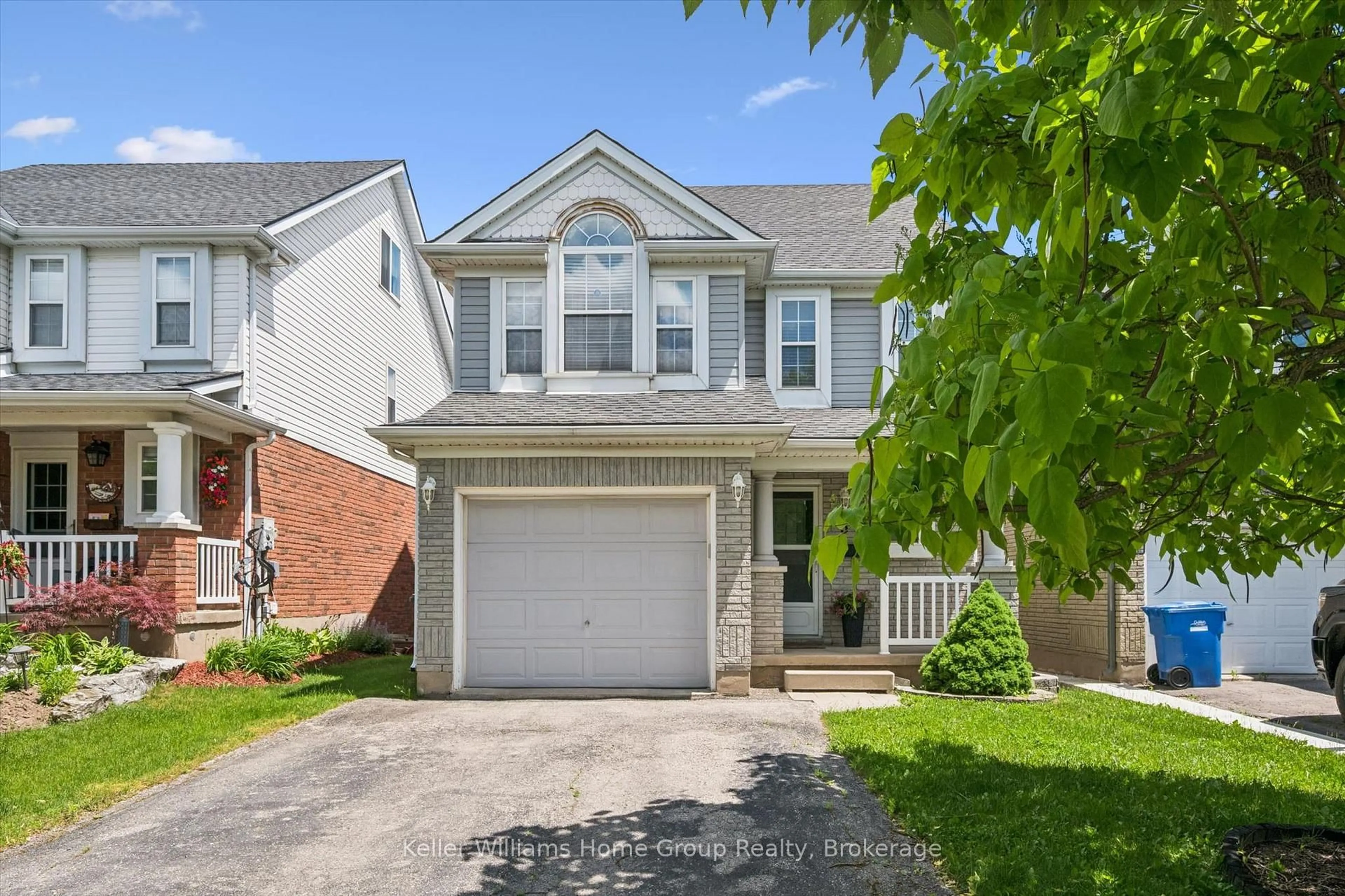 Home with vinyl exterior material, street for 5 Law Dr, Guelph Ontario N1E 7G3
