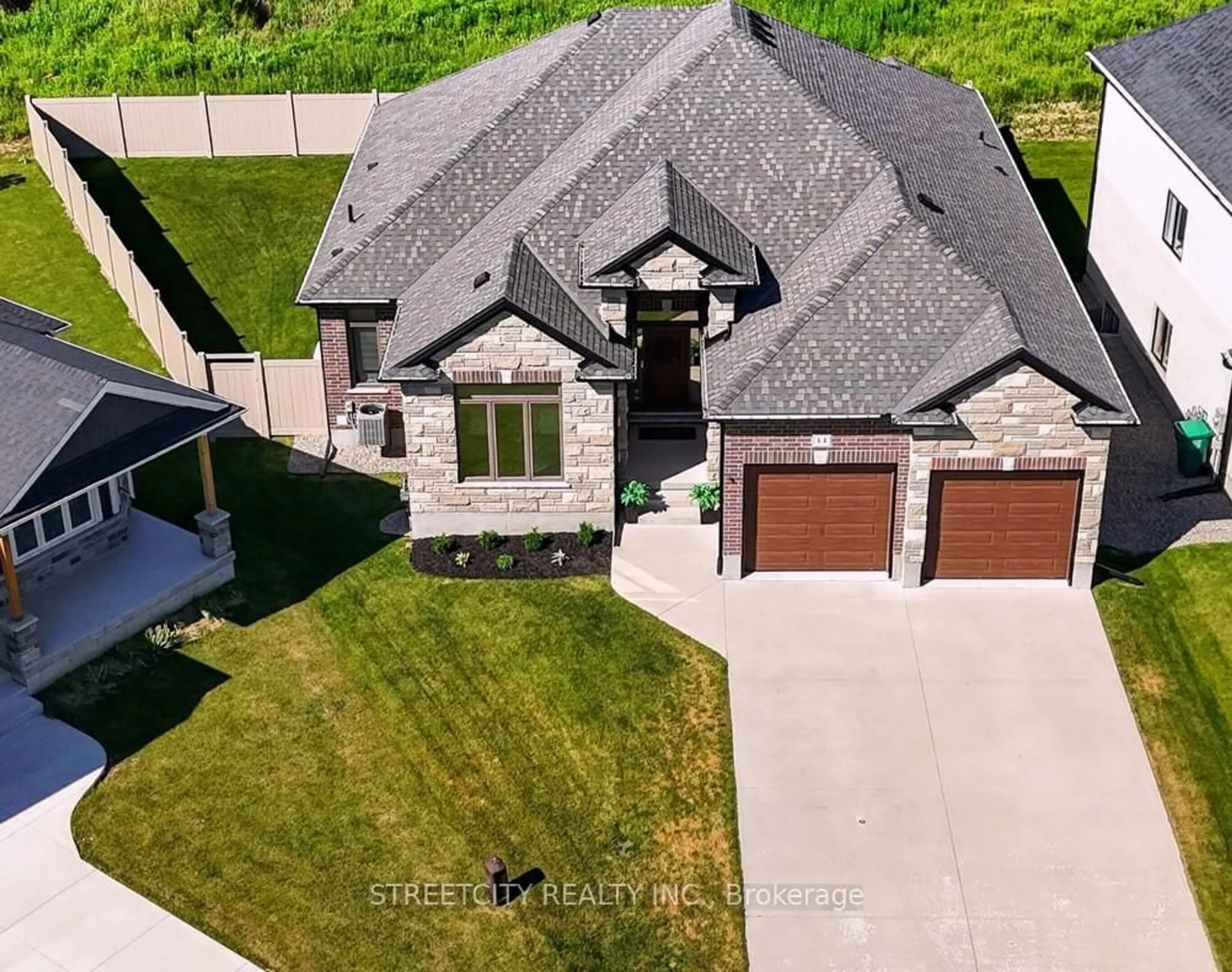 A pic from outside/outdoor area/front of a property/back of a property/a pic from drone, street for 14 Rea Crt, Southwold Ontario N5P 0E8