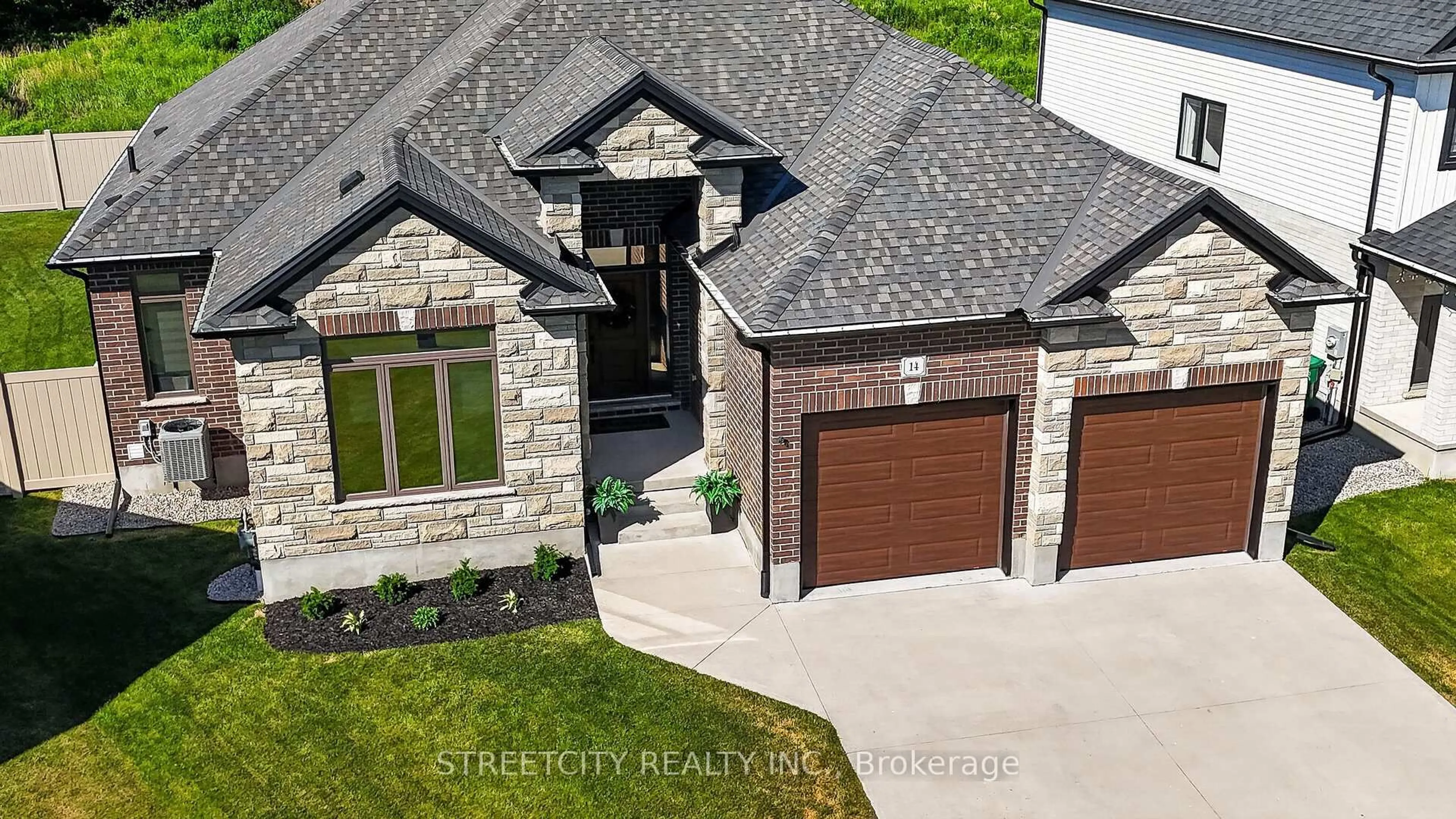 Home with brick exterior material, street for 14 Rea Crt, Southwold Ontario N5P 0E8