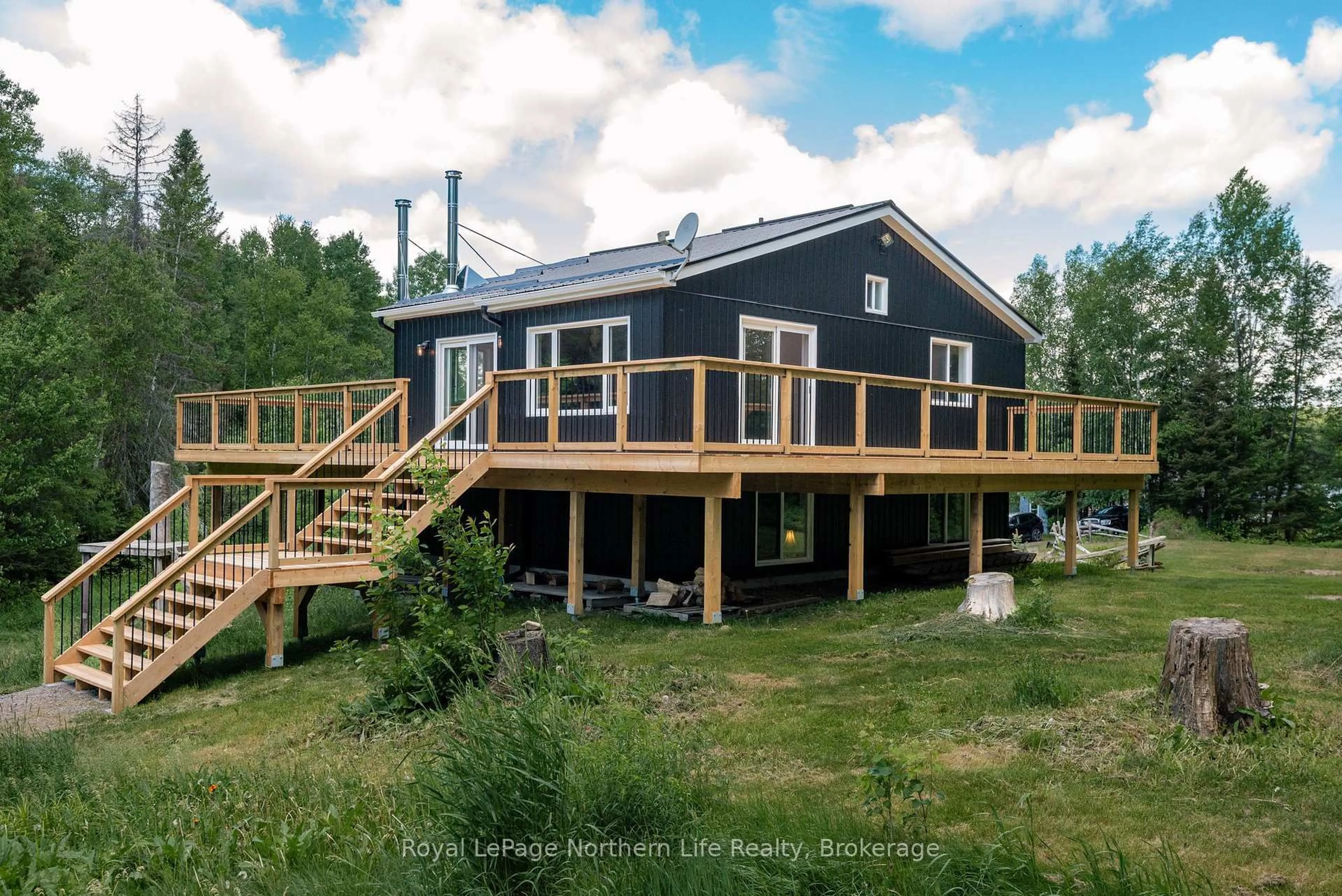 A pic from outside/outdoor area/front of a property/back of a property/a pic from drone, building for 70 Highway 17, Bonfield Ontario P0H 1E0