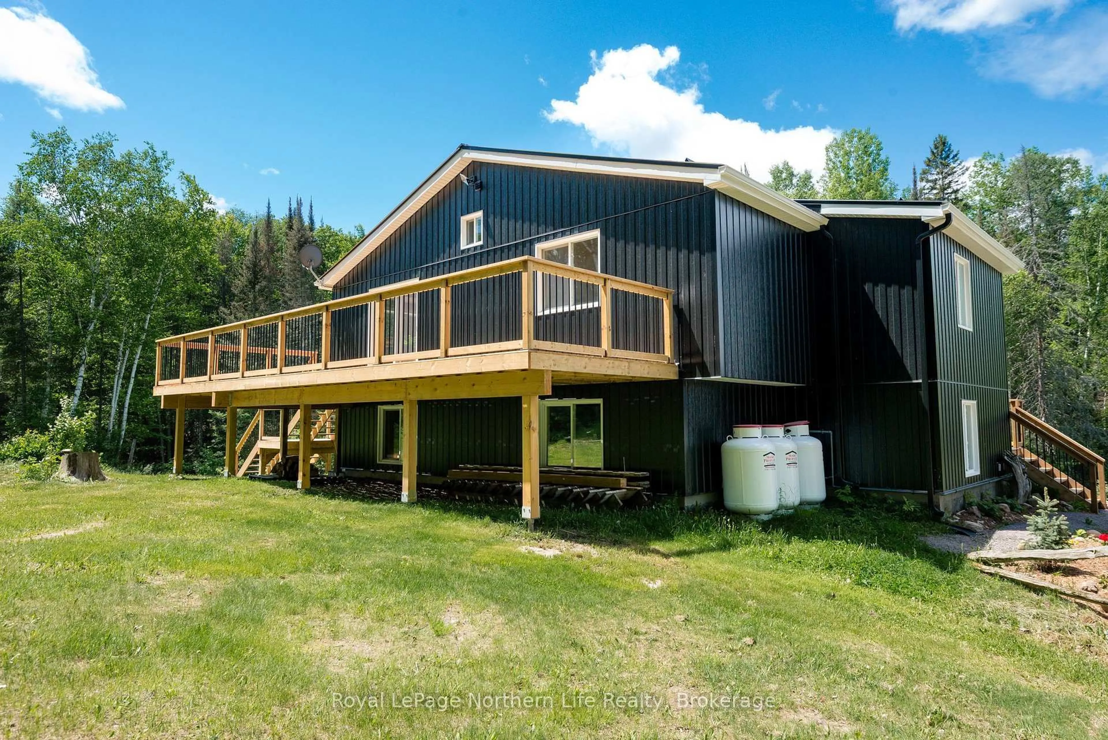 A pic from outside/outdoor area/front of a property/back of a property/a pic from drone, building for 70 Highway 17, Bonfield Ontario P0H 1E0