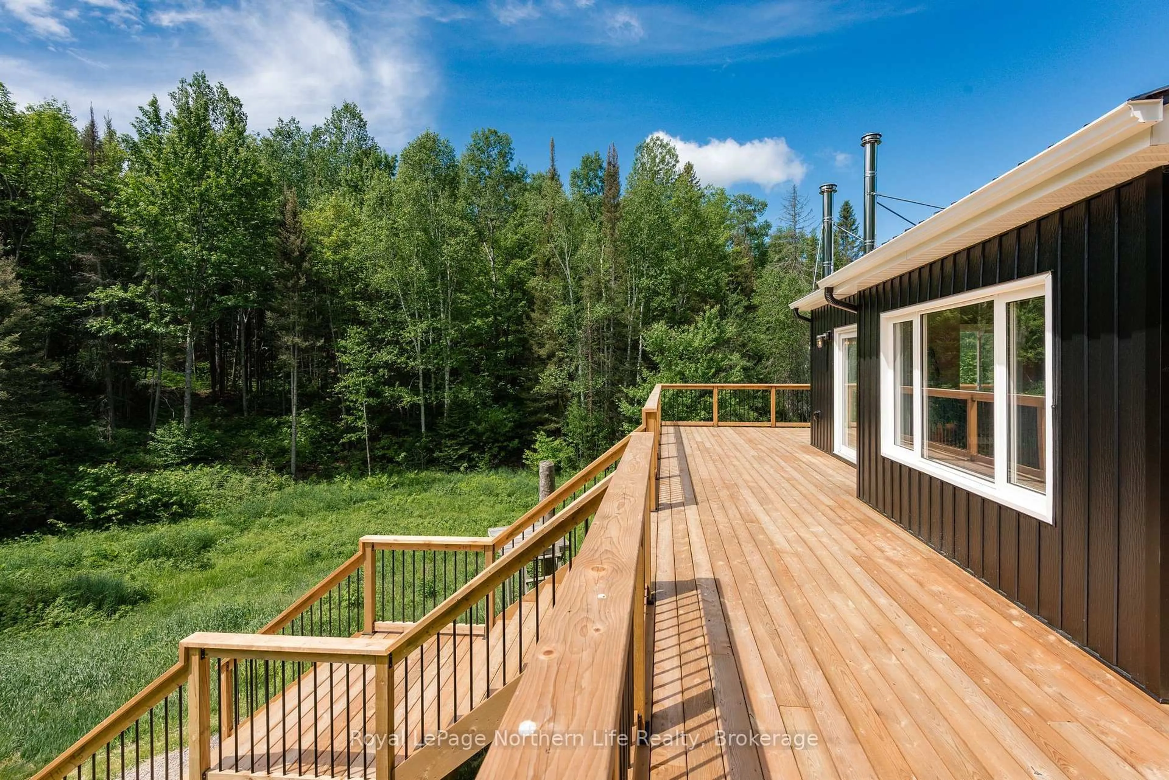 Patio, forest/trees view for 70 Highway 17, Bonfield Ontario P0H 1E0