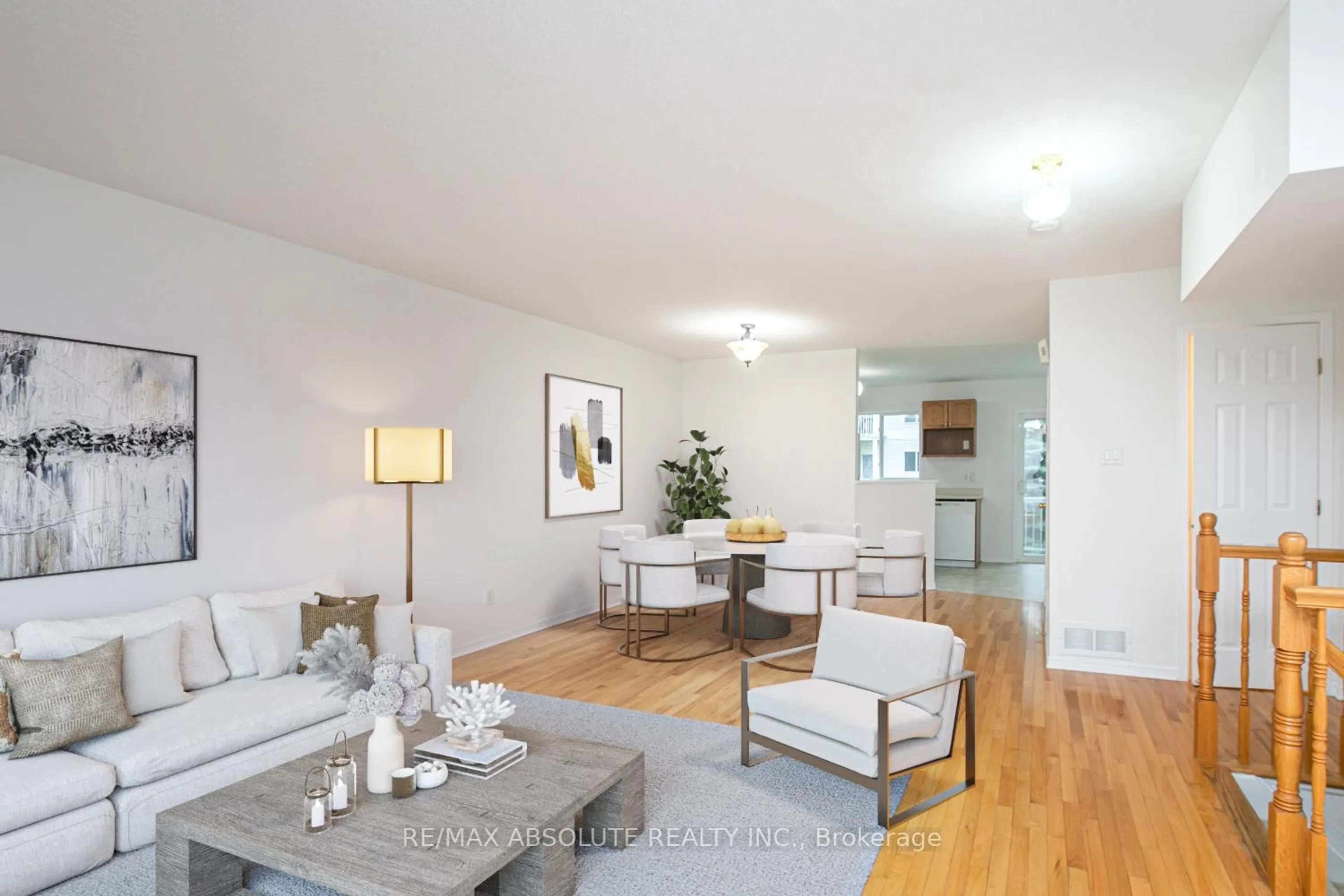 Living room with furniture, wood/laminate floor for 250 Gershwin Private, Ottawa Ontario K2H 1G5