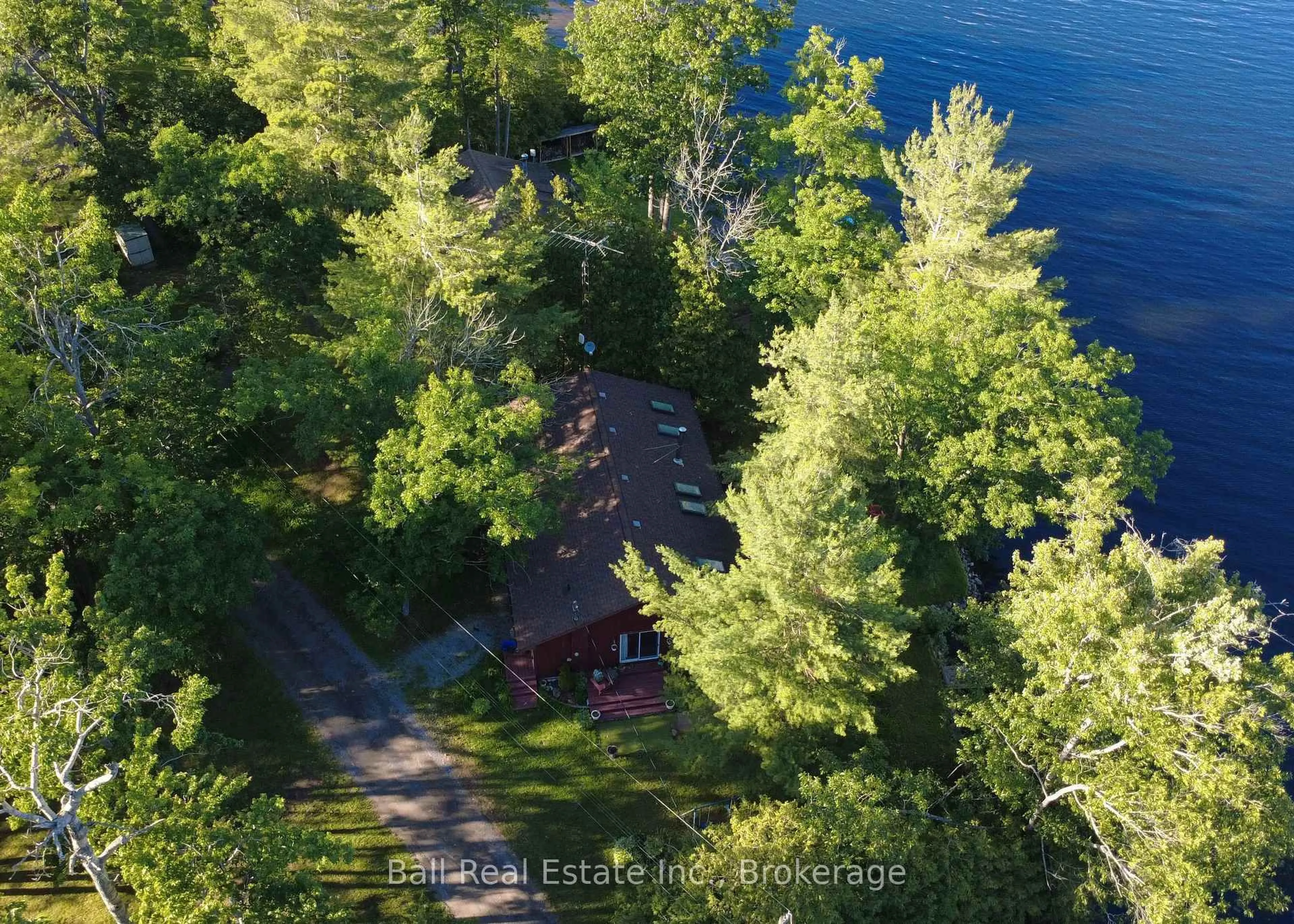 A pic from outside/outdoor area/front of a property/back of a property/a pic from drone, water/lake/river/ocean view for 1855 South Bayshore Rd, Douro-Dummer Ontario K0L 2H0