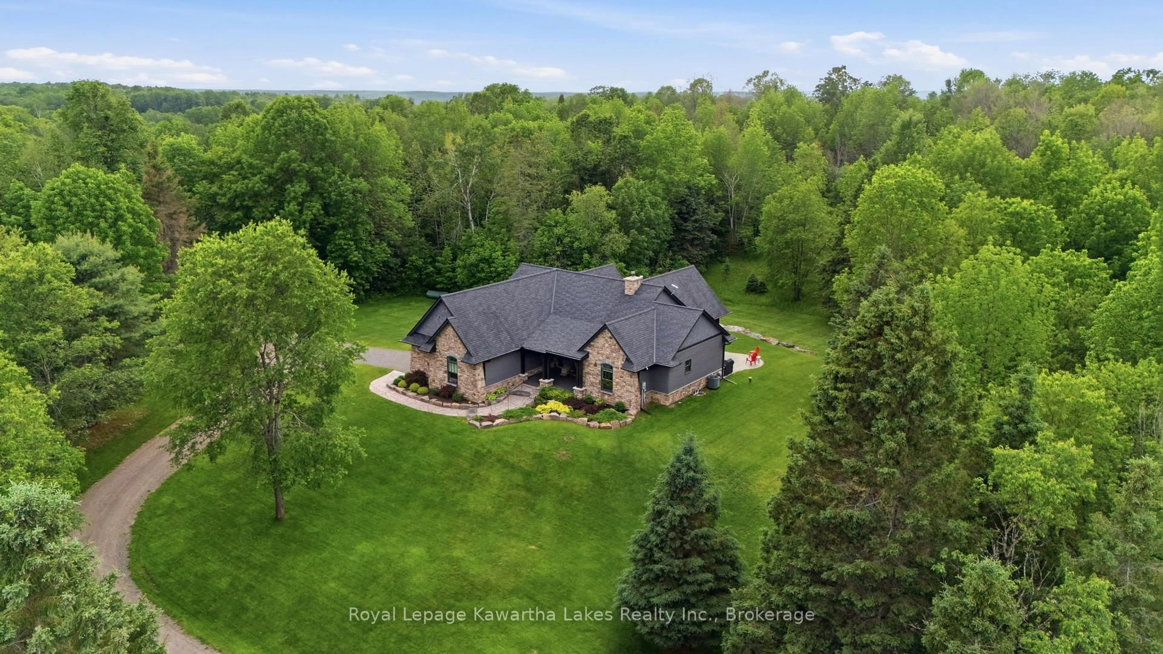A pic from outside/outdoor area/front of a property/back of a property/a pic from drone, unknown for 1446 South Lake Rd, Minden Hills Ontario K0M 2K0