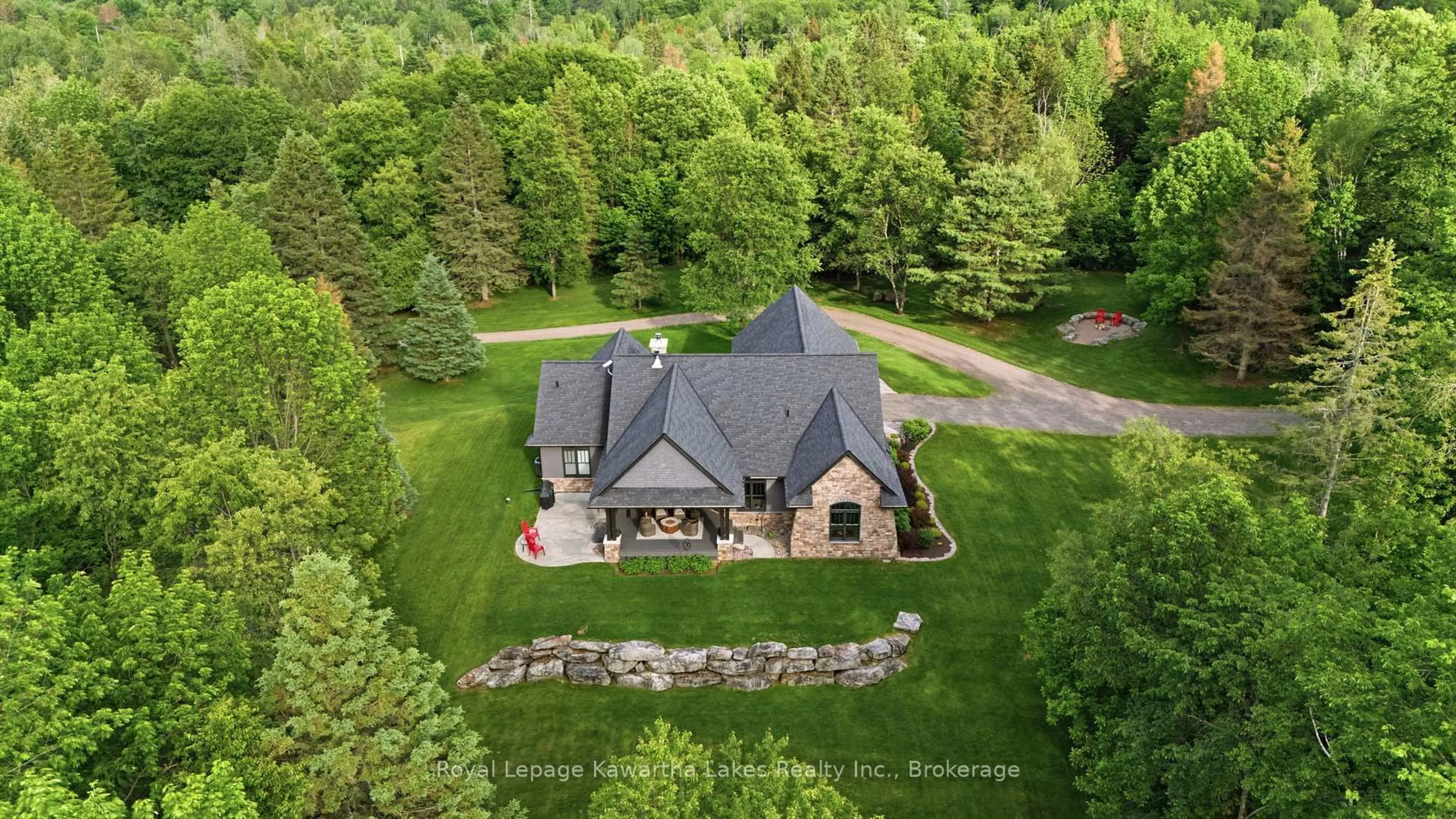 A pic from outside/outdoor area/front of a property/back of a property/a pic from drone, unknown for 1446 South Lake Rd, Minden Hills Ontario K0M 2K0