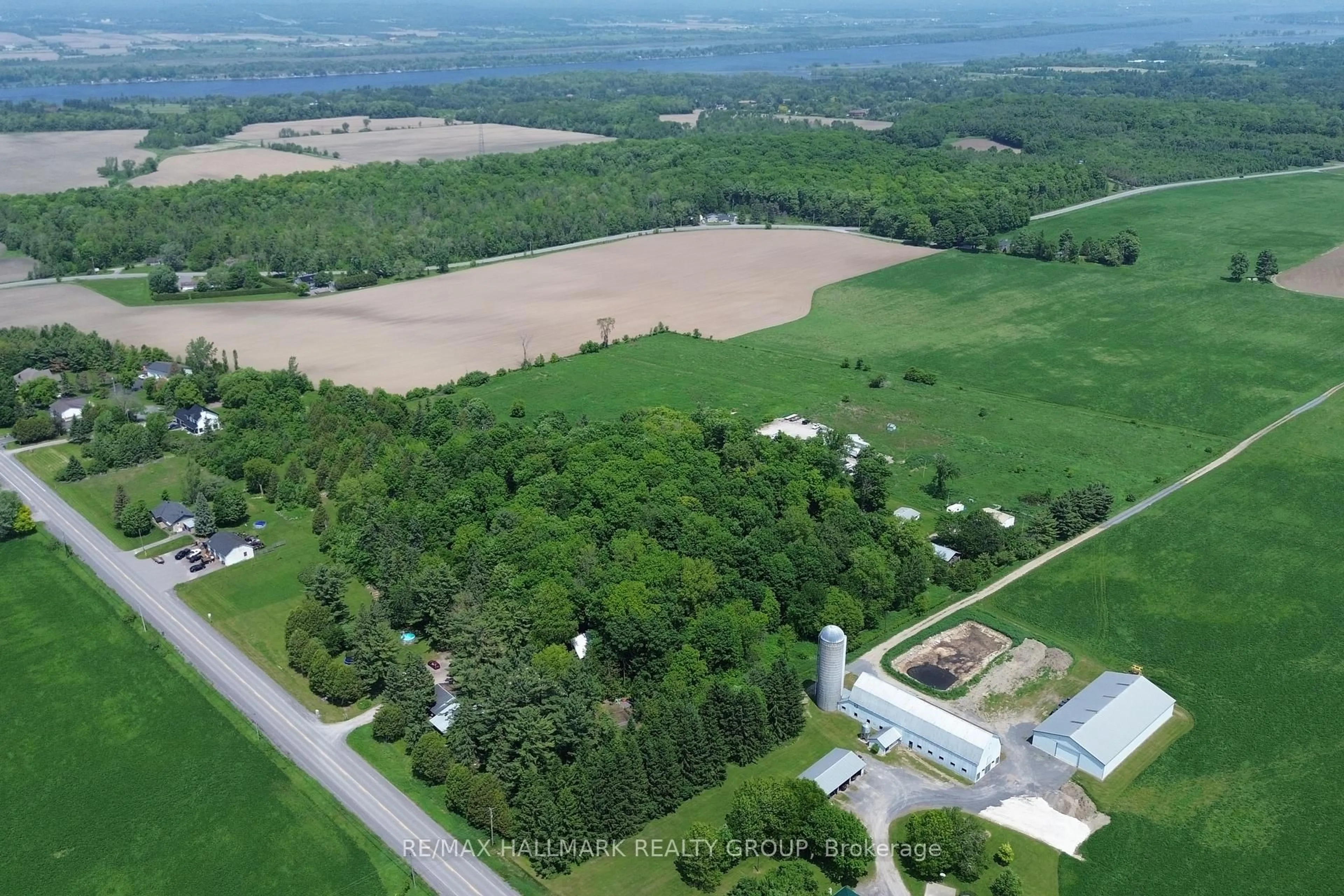 A pic from outside/outdoor area/front of a property/back of a property/a pic from drone, water/lake/river/ocean view for 1675 Dunning Rd, Cumberland Ontario K4C 1L7