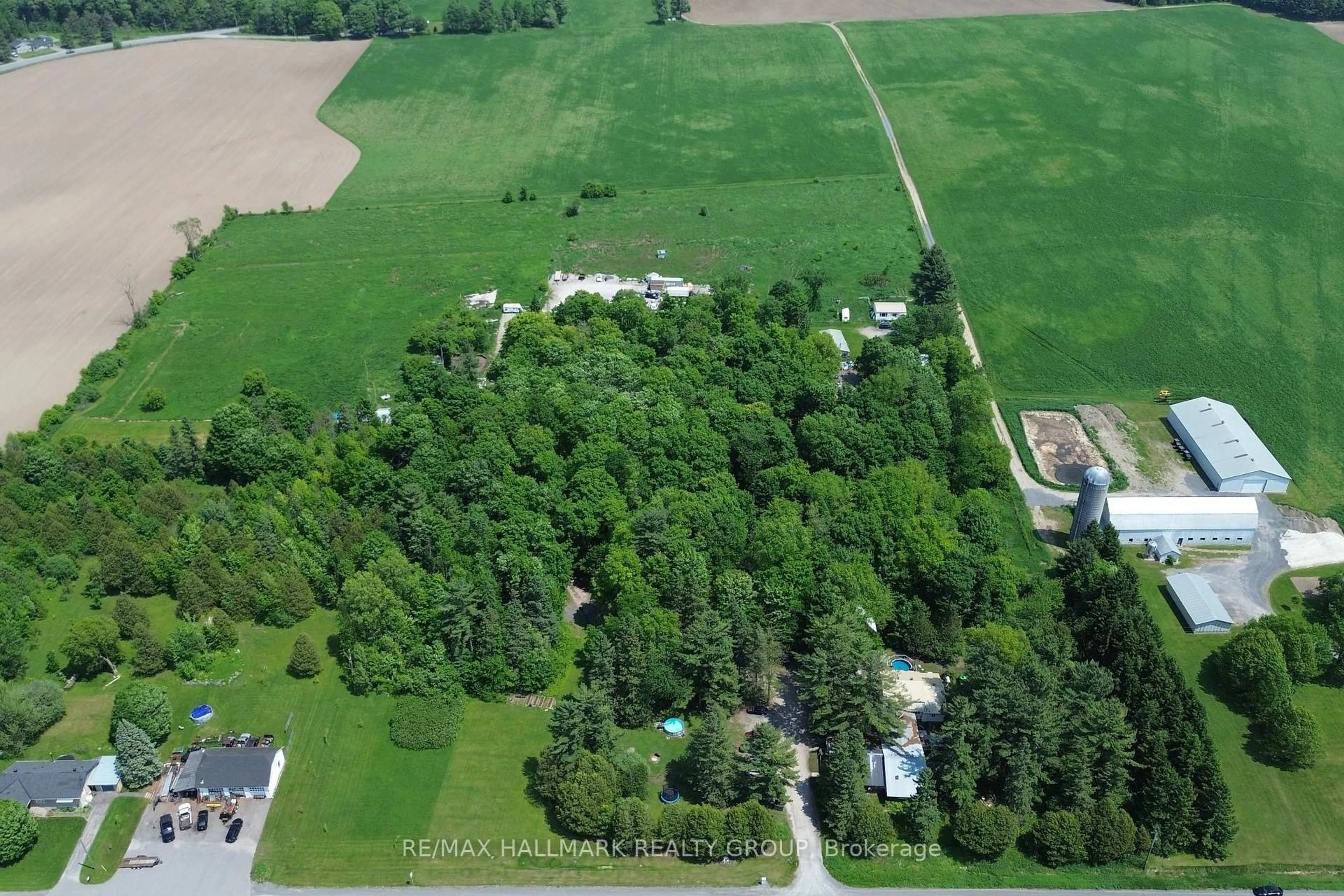 A pic from outside/outdoor area/front of a property/back of a property/a pic from drone, forest/trees view for 1675 Dunning Rd, Cumberland Ontario K4C 1L7