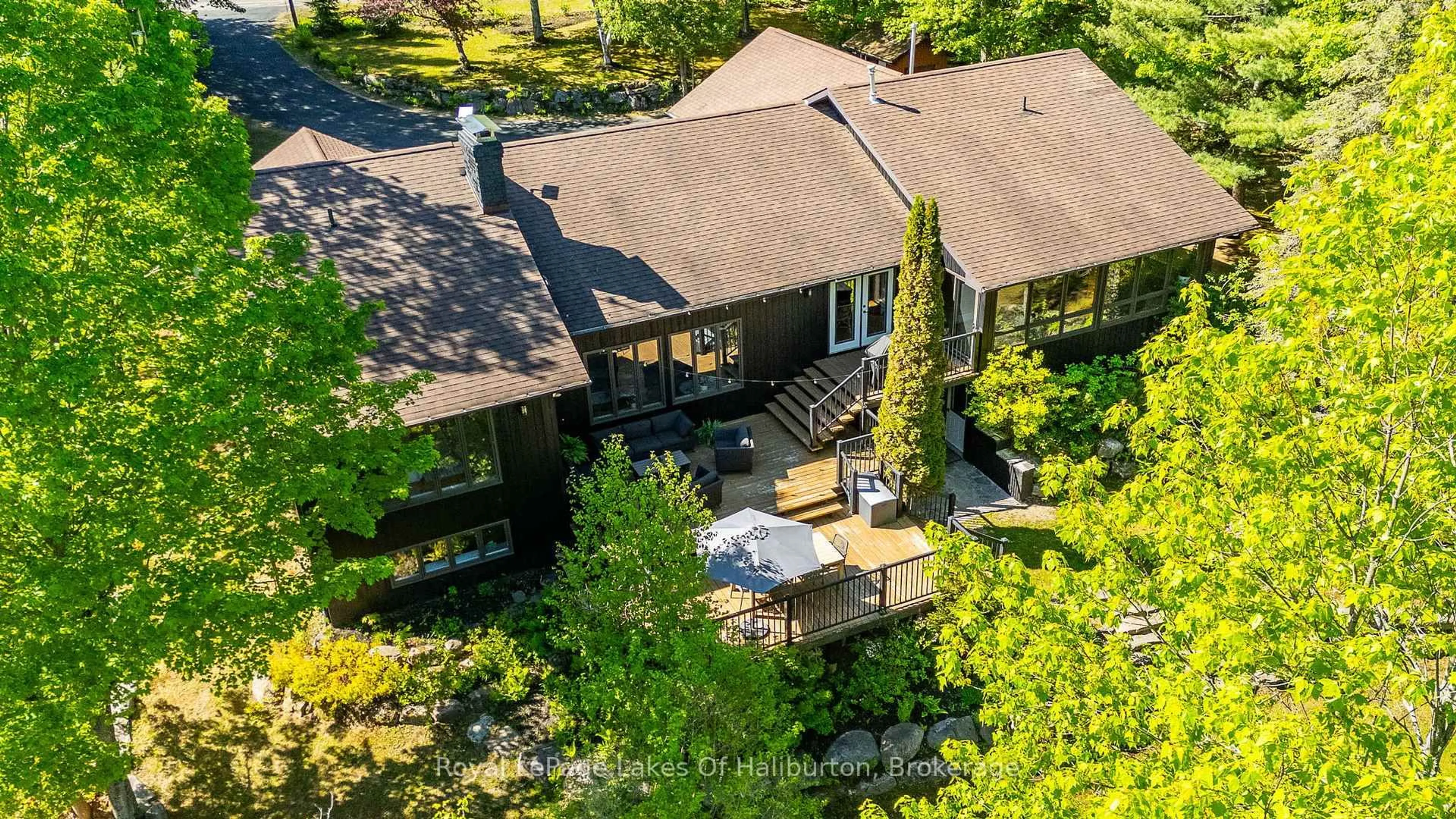 A pic from outside/outdoor area/front of a property/back of a property/a pic from drone, unknown for 2697 Kashagawigamog Lake Rd, Dysart et al Ontario K0M 1S0