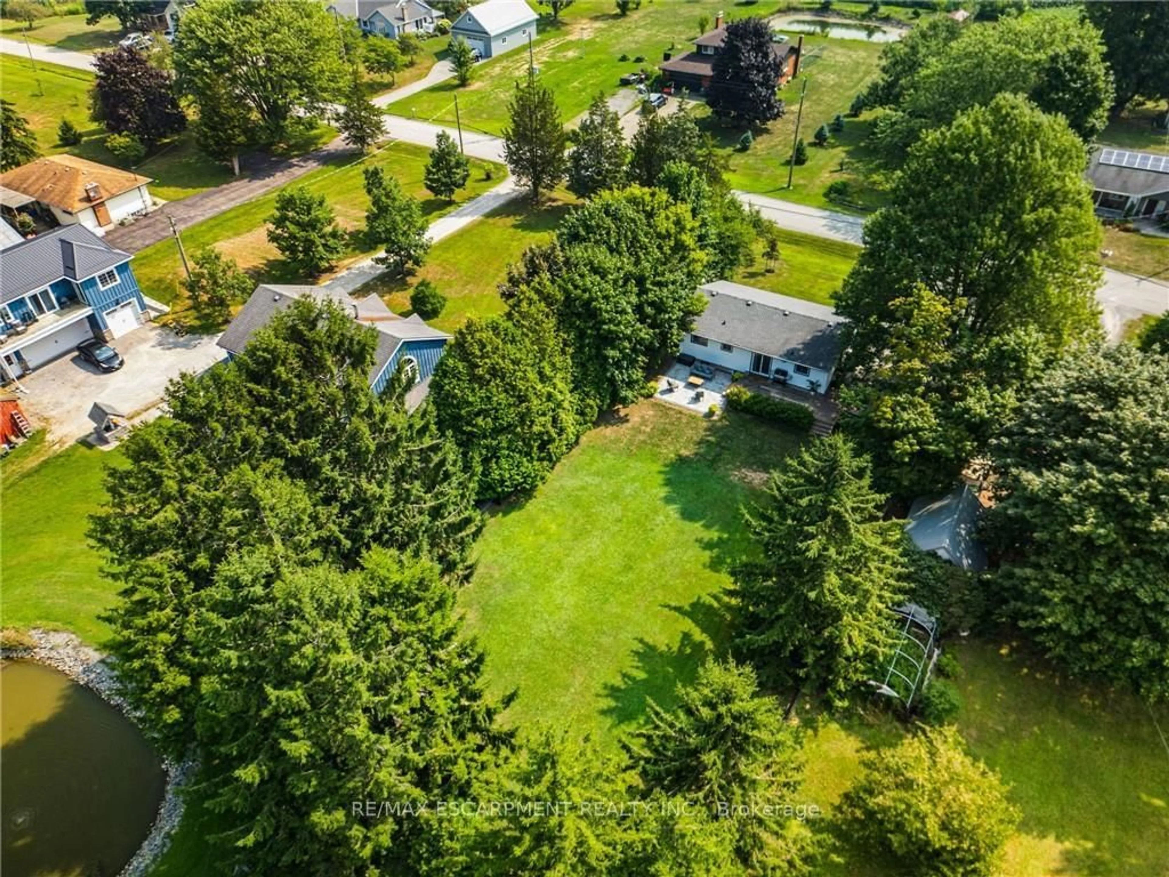 A pic from outside/outdoor area/front of a property/back of a property/a pic from drone, forest/trees view for 53018 Perry Rd, Wainfleet Ontario L0S 1V0