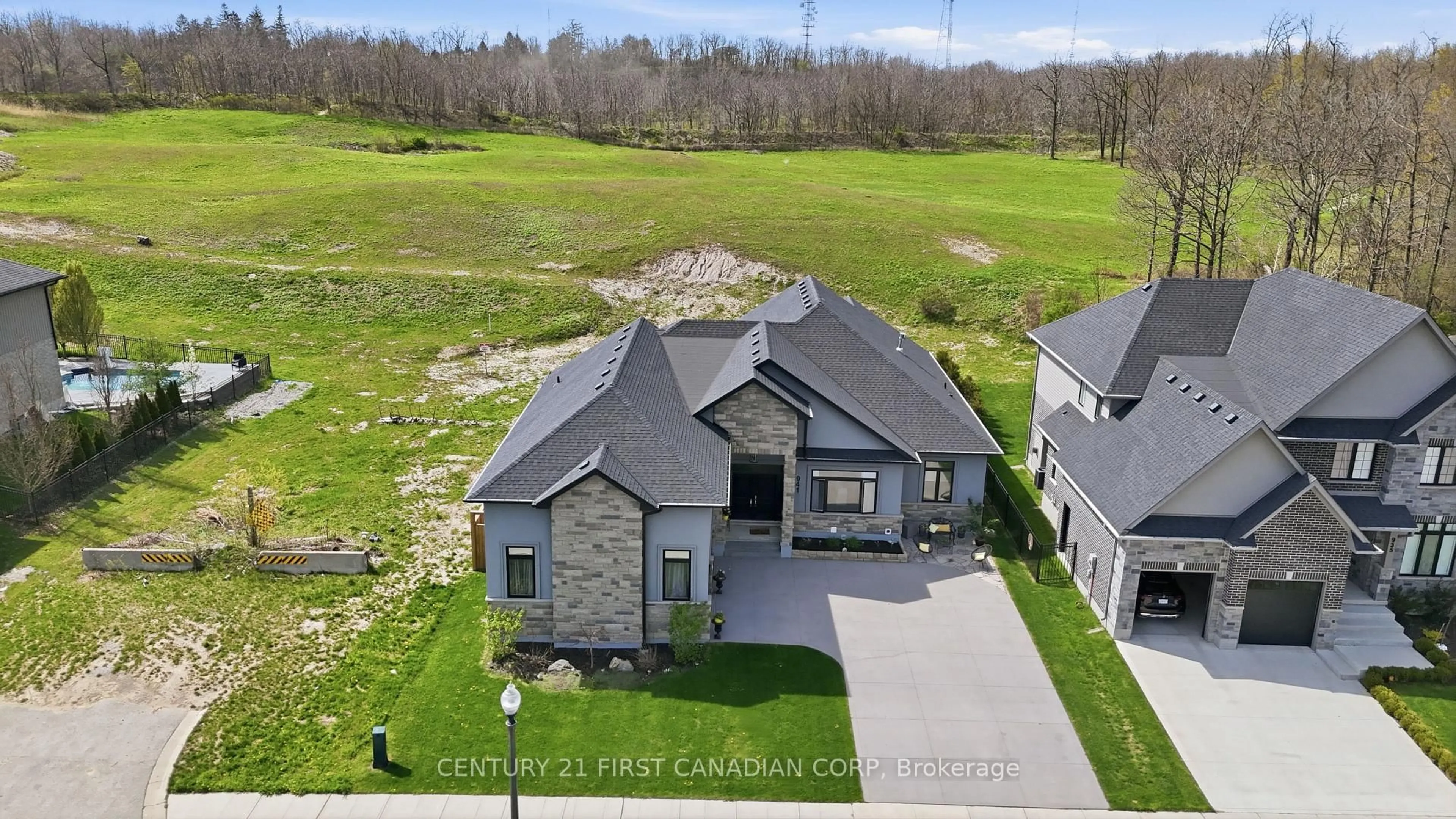 A pic from outside/outdoor area/front of a property/back of a property/a pic from drone, unknown for 941 Longworth Rd, London South Ontario N6K 0C9