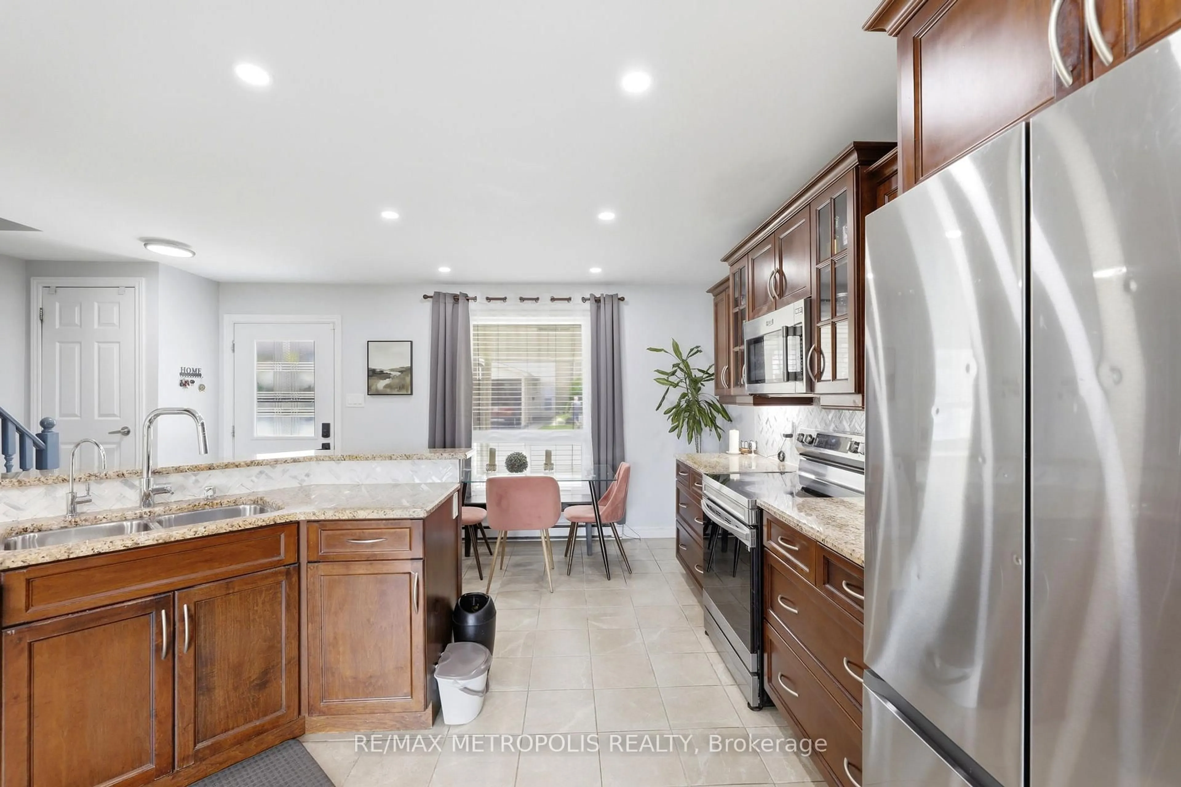 Open concept kitchen, ceramic/tile floor for 801 Osgoode Dr #62, London South Ontario N6E 2G8