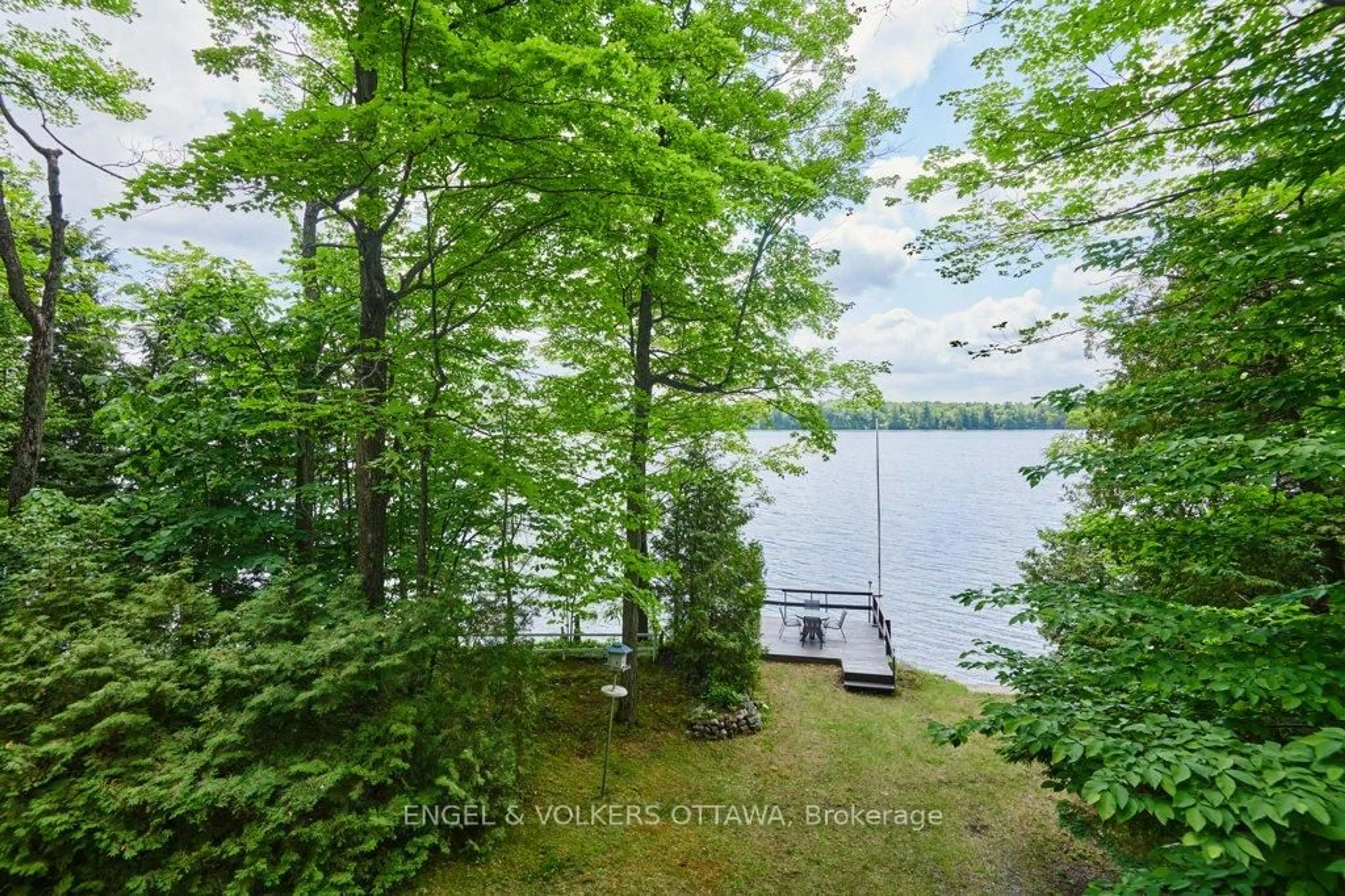 A pic from outside/outdoor area/front of a property/back of a property/a pic from drone, water/lake/river/ocean view for 1054 Coutlee Point Lane, Sharbot Lake Ontario K0H 2P0