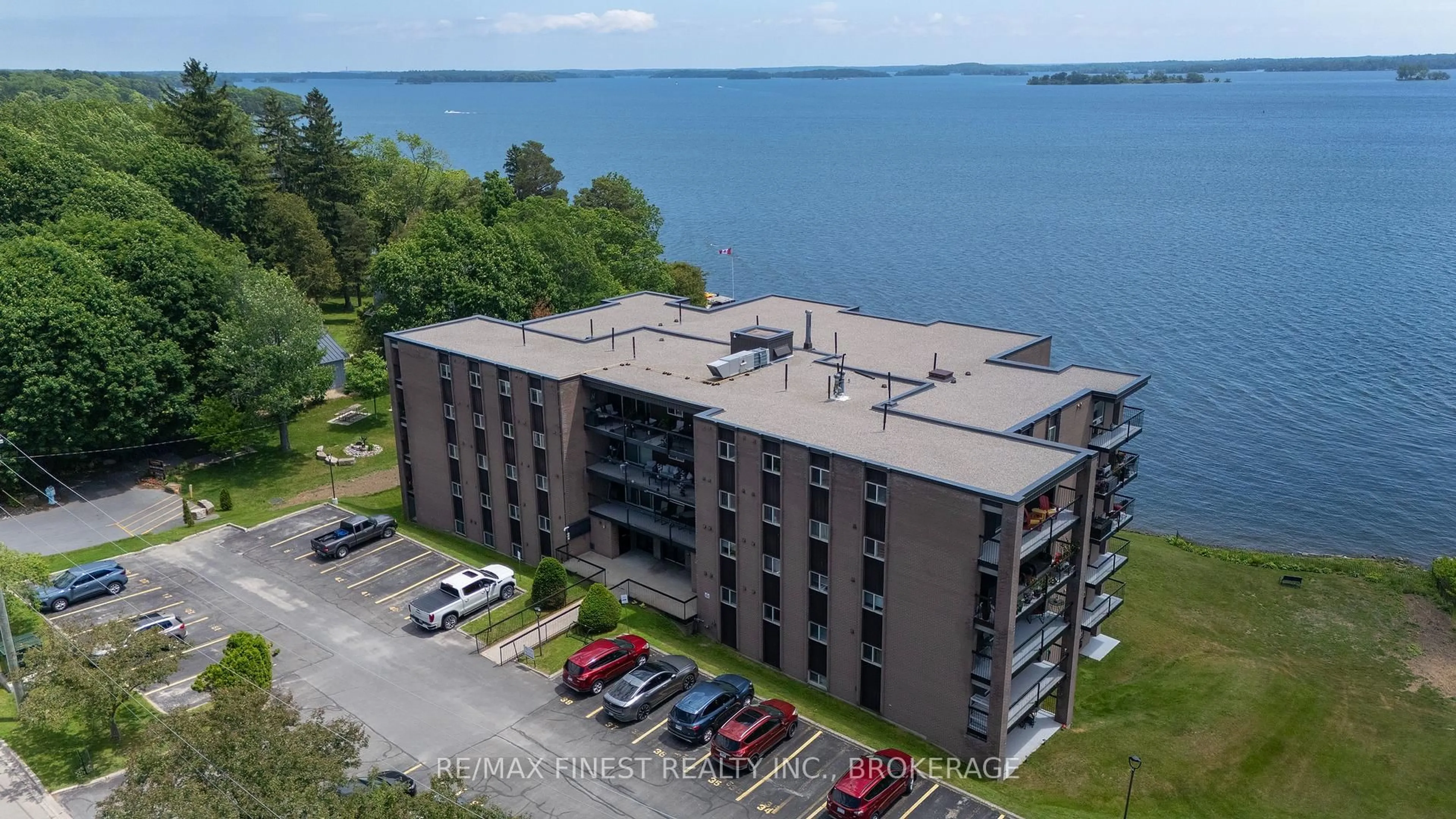 A pic from outside/outdoor area/front of a property/back of a property/a pic from drone, water/lake/river/ocean view for 610 William St #101, Gananoque Ontario K7G 3A4