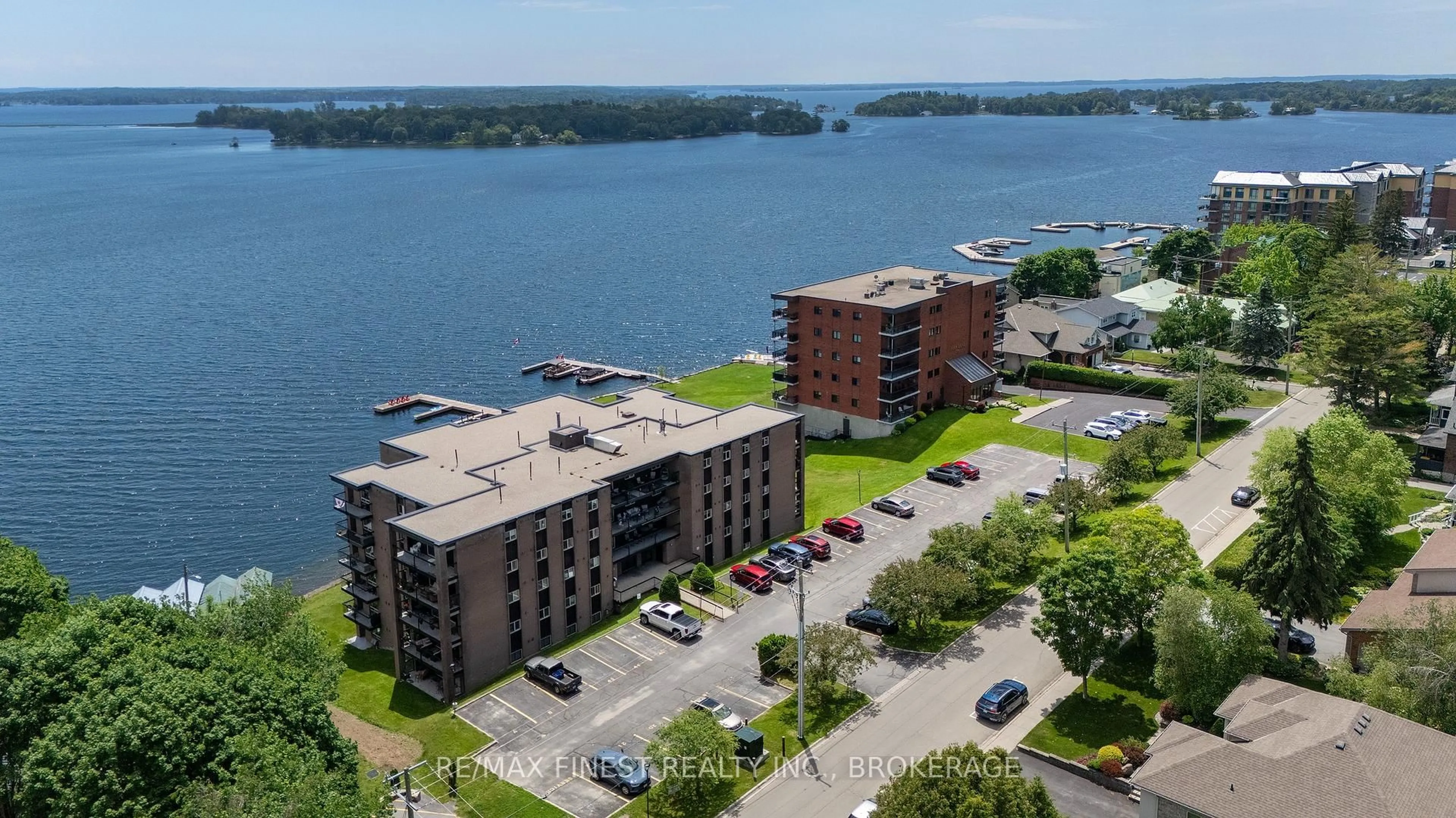 A pic from outside/outdoor area/front of a property/back of a property/a pic from drone, water/lake/river/ocean view for 610 William St #101, Gananoque Ontario K7G 3A4