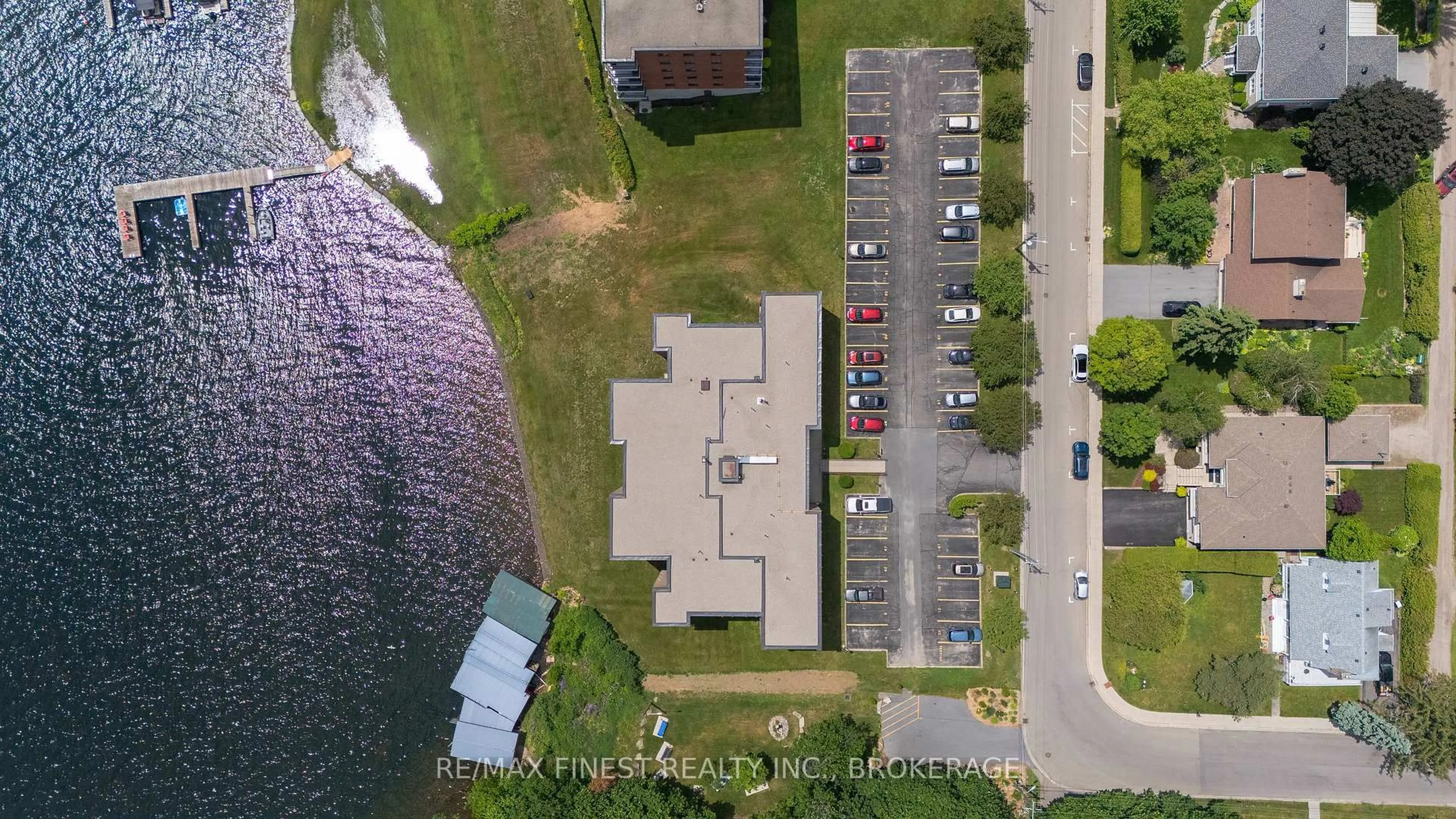 A pic from outside/outdoor area/front of a property/back of a property/a pic from drone, water/lake/river/ocean view for 610 William St #101, Gananoque Ontario K7G 3A4