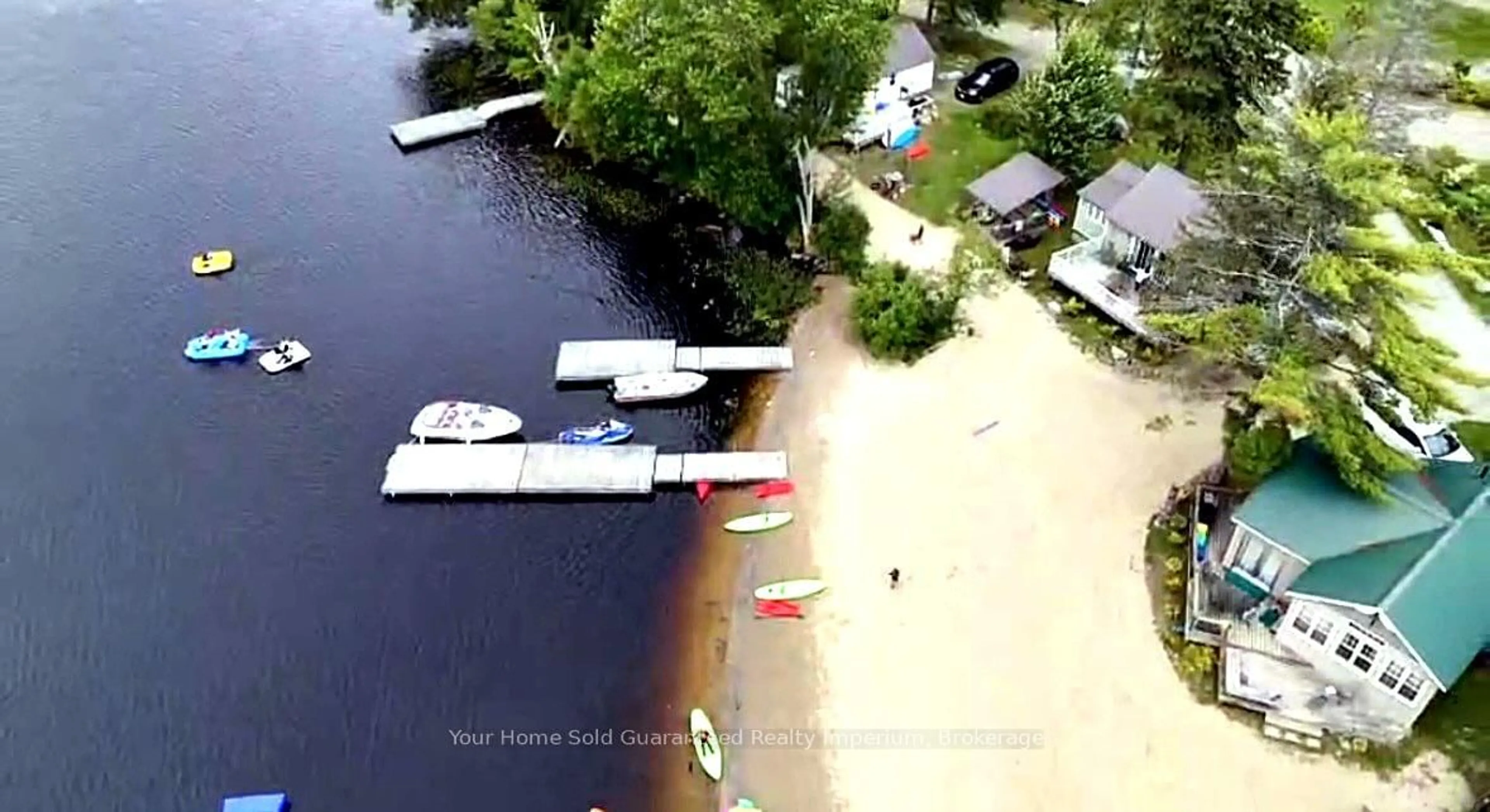 A pic from outside/outdoor area/front of a property/back of a property/a pic from drone, water/lake/river/ocean view for 3 WOODLAND Lane, Magnetawan Ontario P0A 1P0