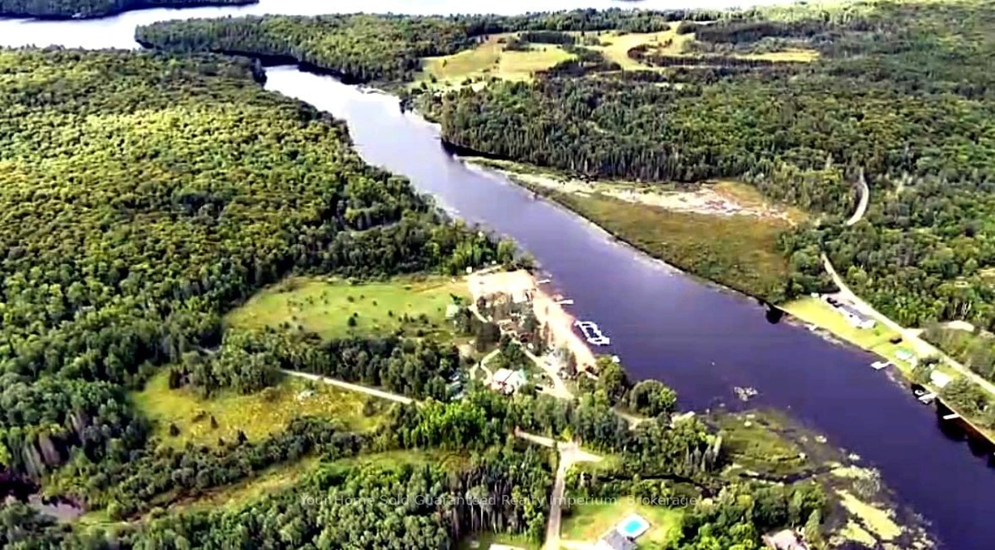 A pic from outside/outdoor area/front of a property/back of a property/a pic from drone, water/lake/river/ocean view for 3 WOODLAND Lane, Magnetawan Ontario P0A 1P0