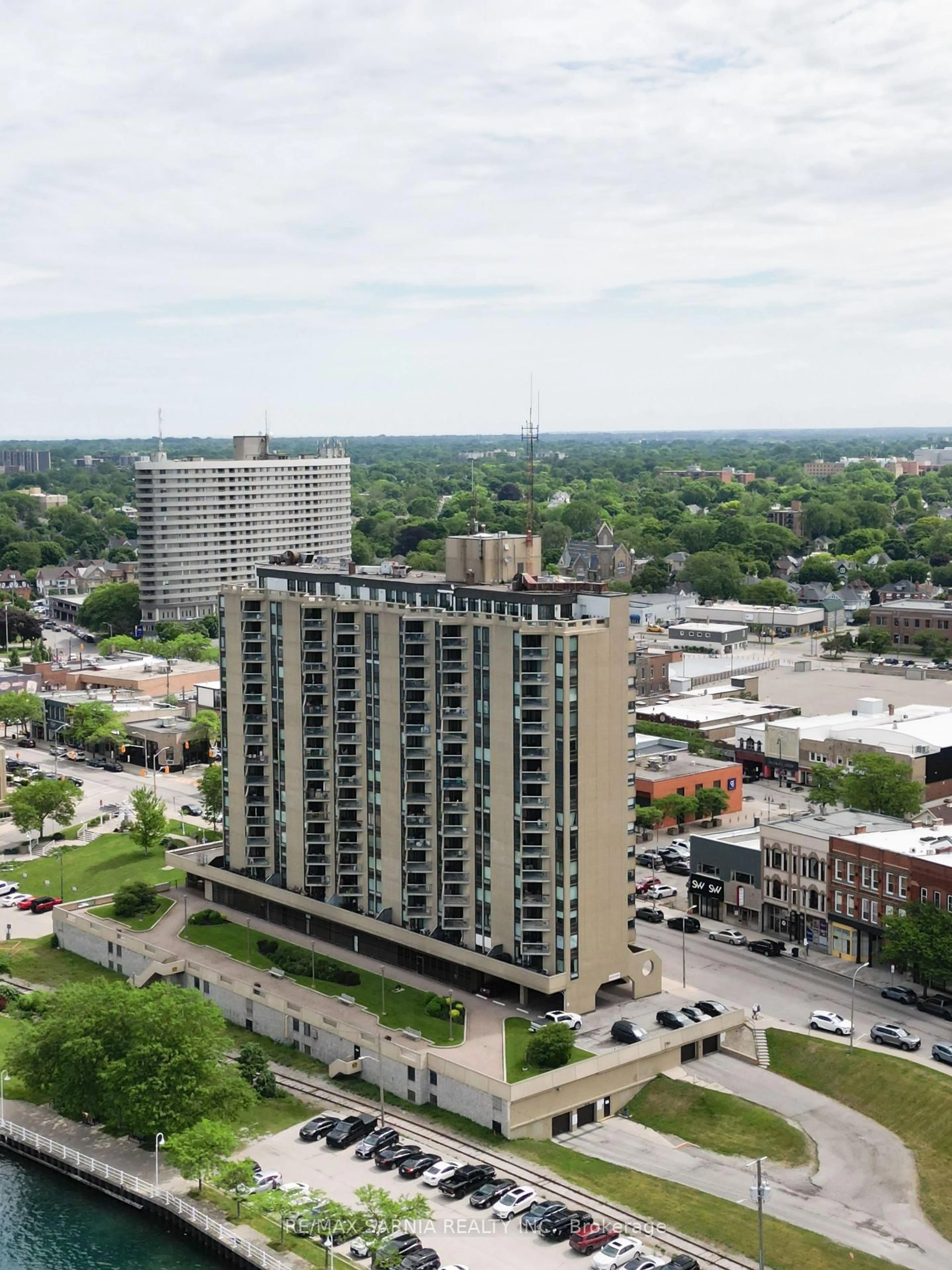 A pic from outside/outdoor area/front of a property/back of a property/a pic from drone, city buildings view from balcony for 155 Front St #1204, Sarnia Ontario N7T 7V5