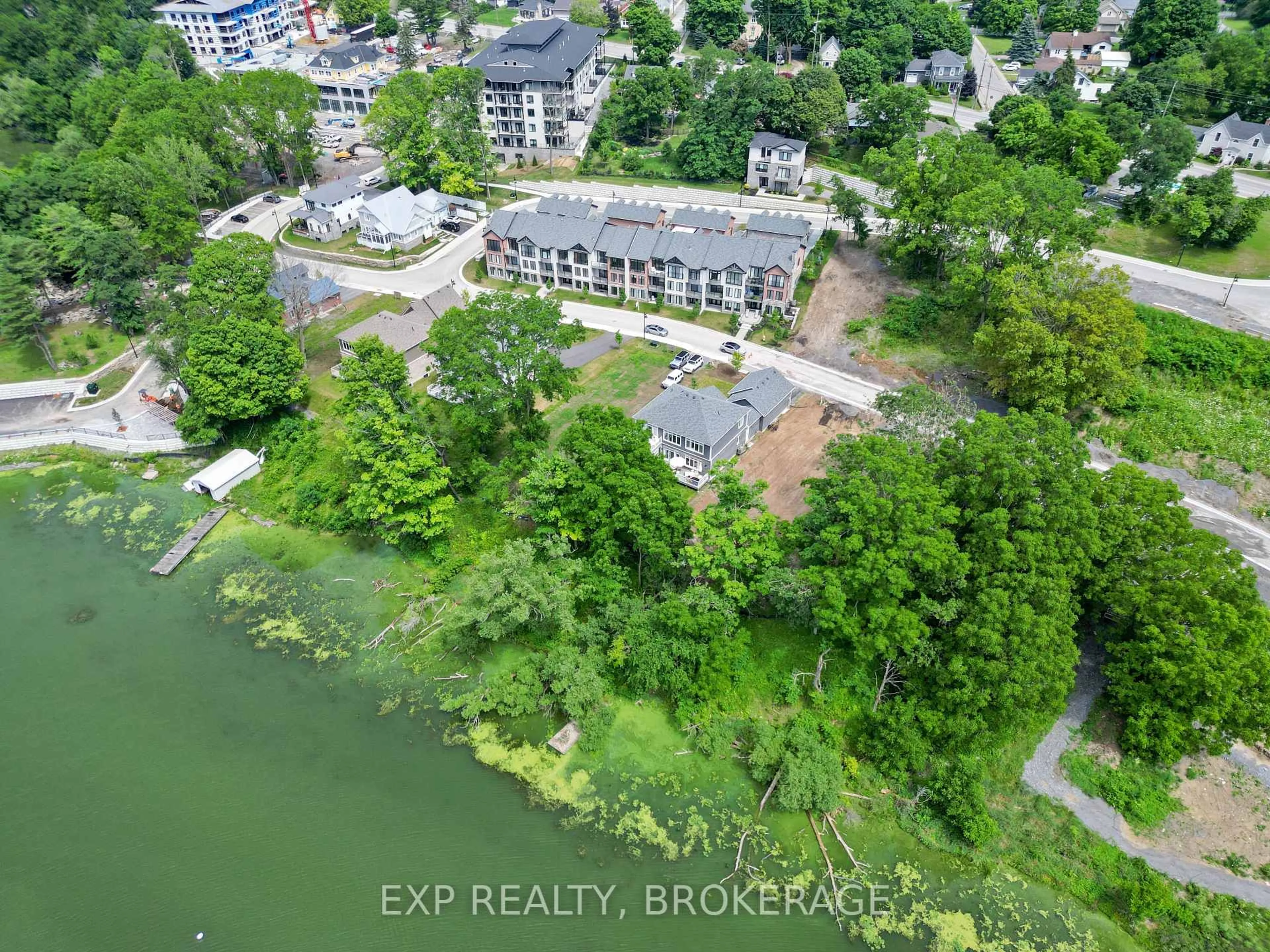 A pic from outside/outdoor area/front of a property/back of a property/a pic from drone, water/lake/river/ocean view for 101 VILLENEUVE Dr, Prince Edward County Ontario K0K 2T0