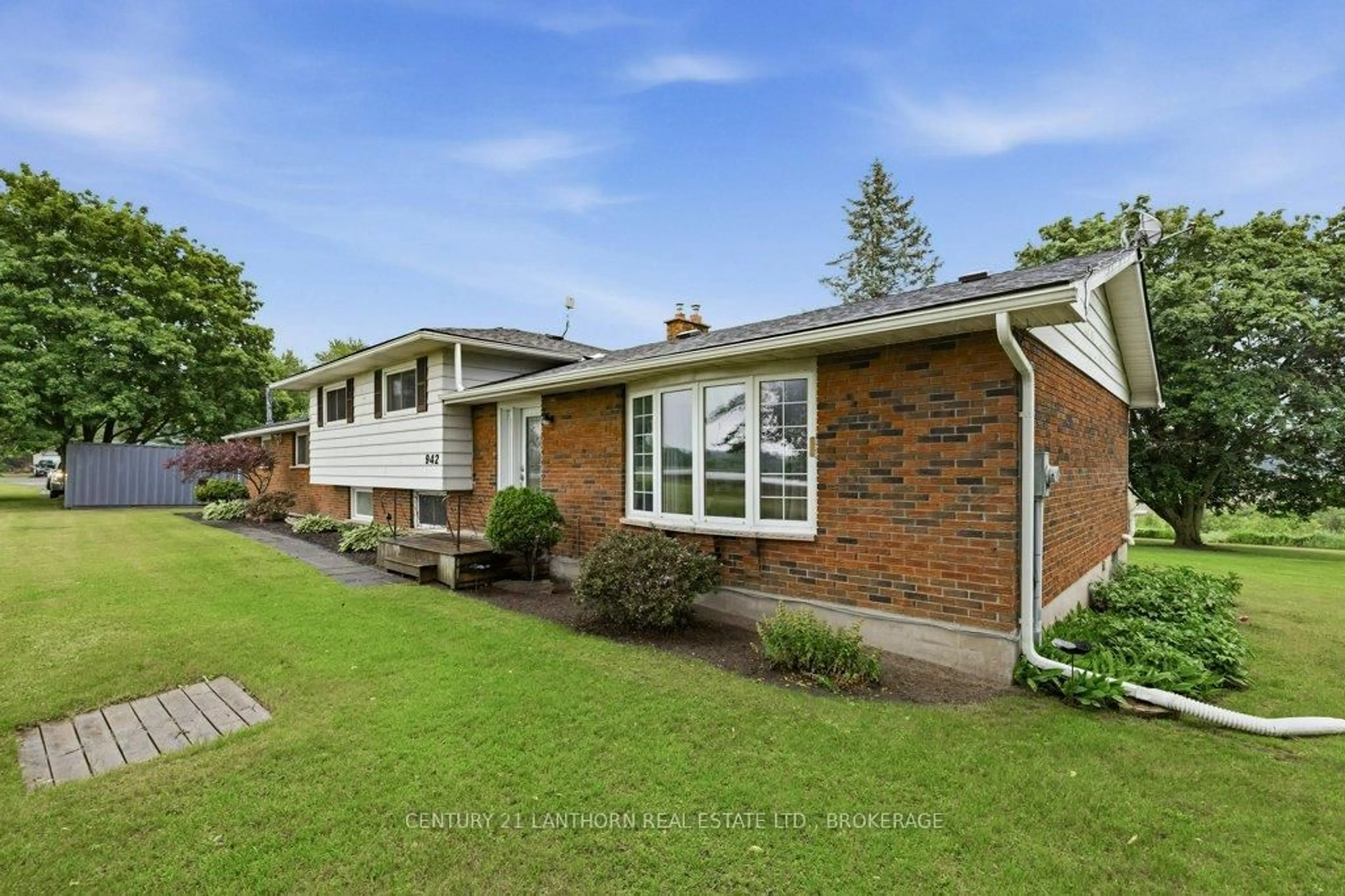 Home with brick exterior material, street for 942 County 1 Rd, Plantagenet Ontario K7R 3L2