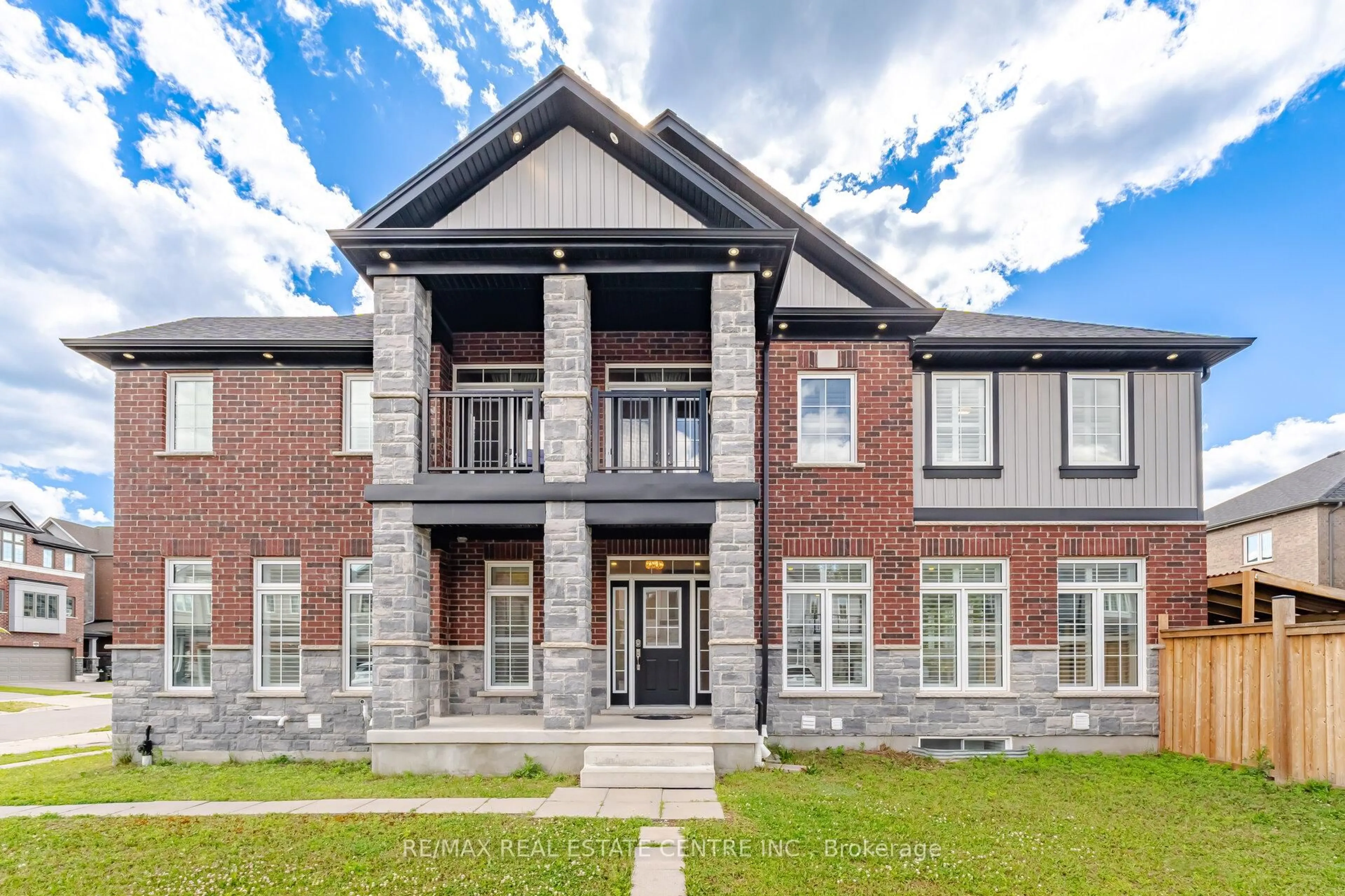 Home with brick exterior material, building for 127 Monarch Woods Dr, Kitchener Ontario N2P 2Y9