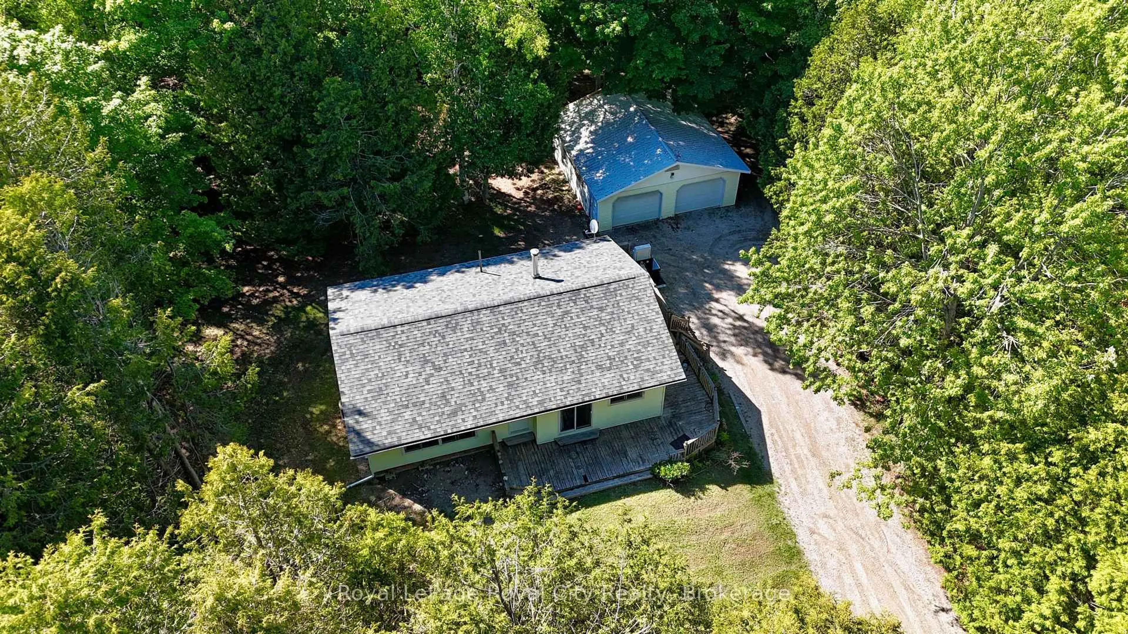 A pic from outside/outdoor area/front of a property/back of a property/a pic from drone, street for 42 Warner Bay Rd, Northern Bruce Peninsula Ontario N0H 2R0