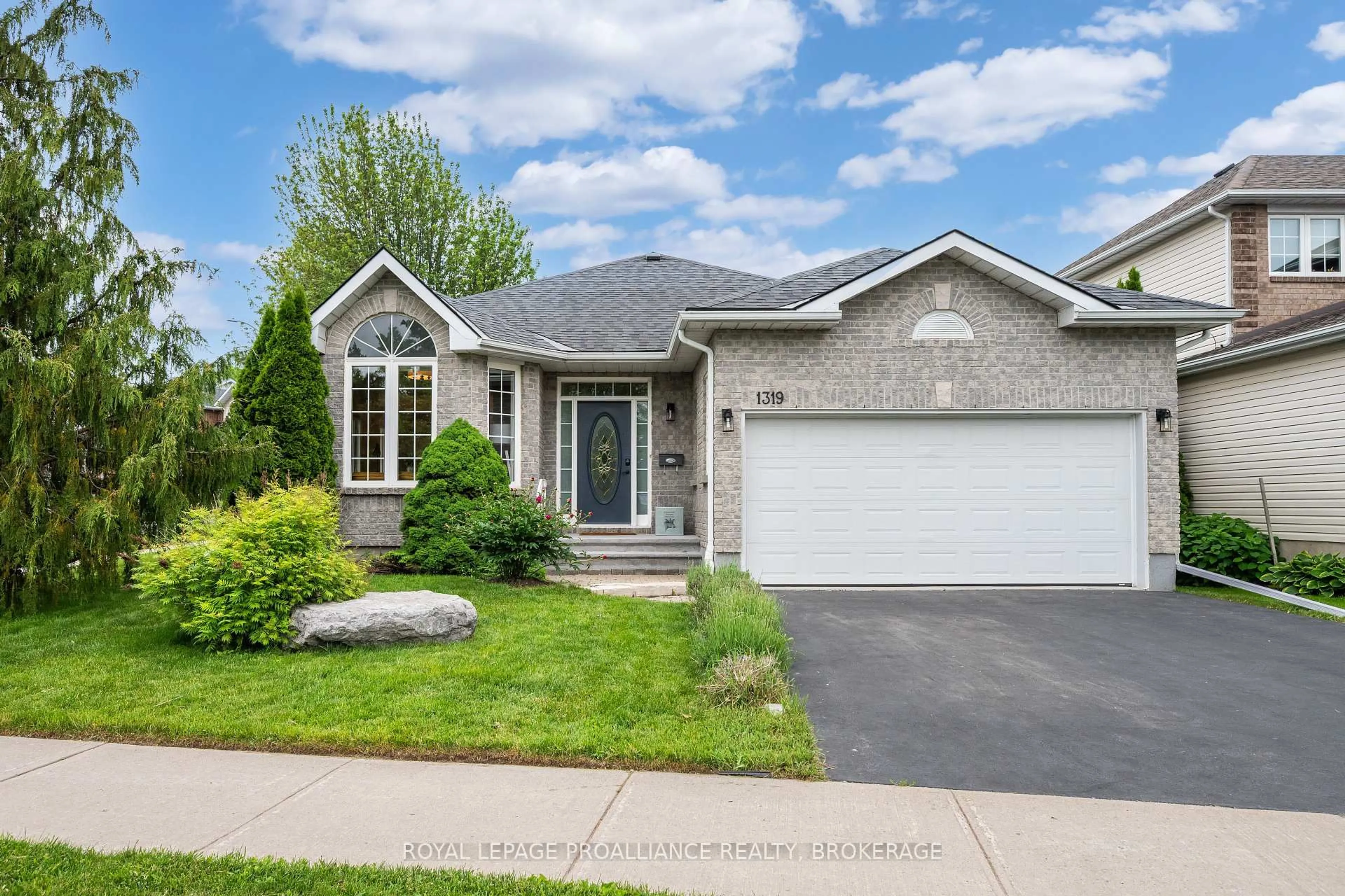 Home with brick exterior material, street for 1319 Waterside Way, Kingston Ontario K7K 7J8