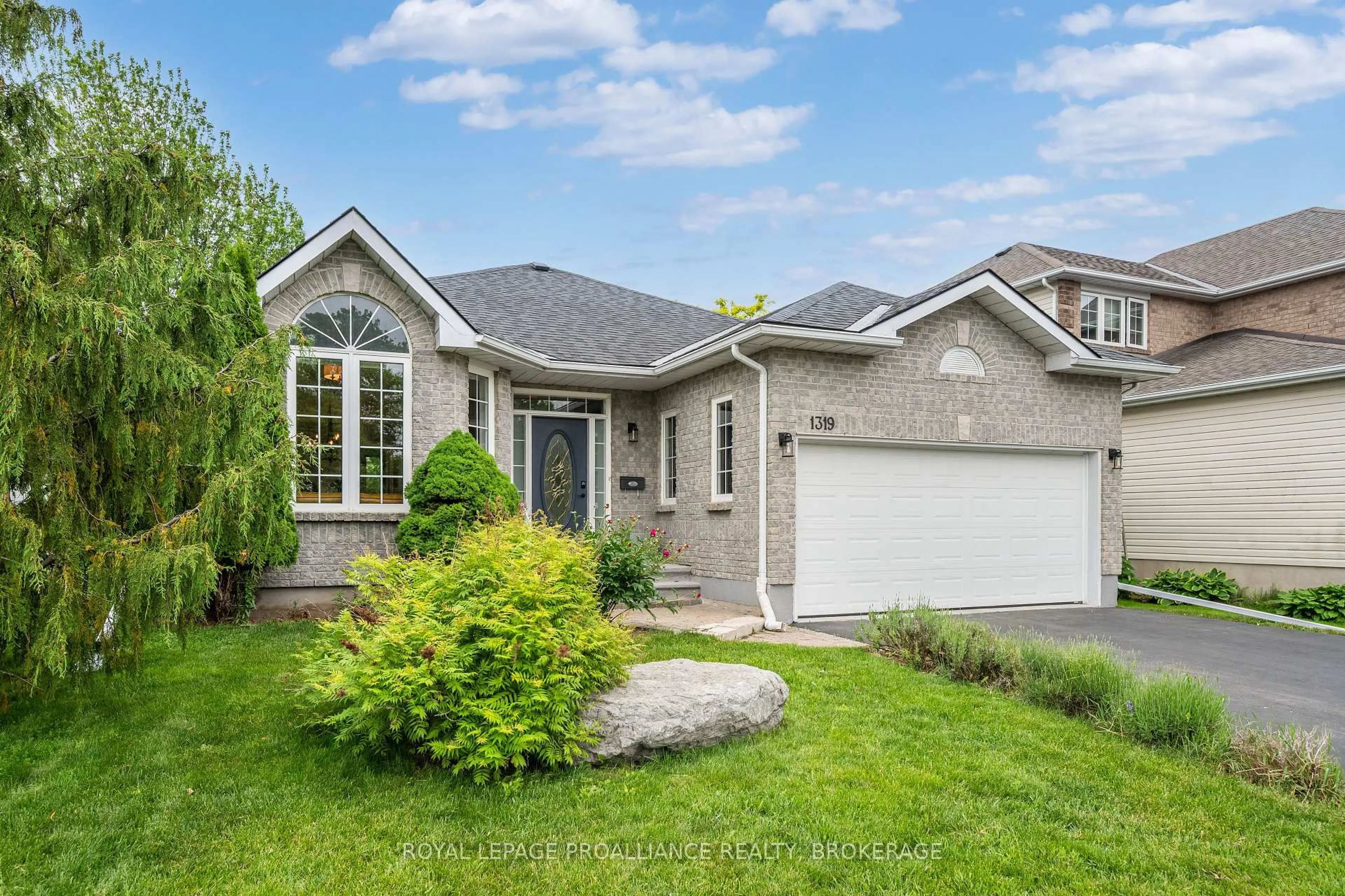 Home with brick exterior material, street for 1319 Waterside Way, Kingston Ontario K7K 7J8