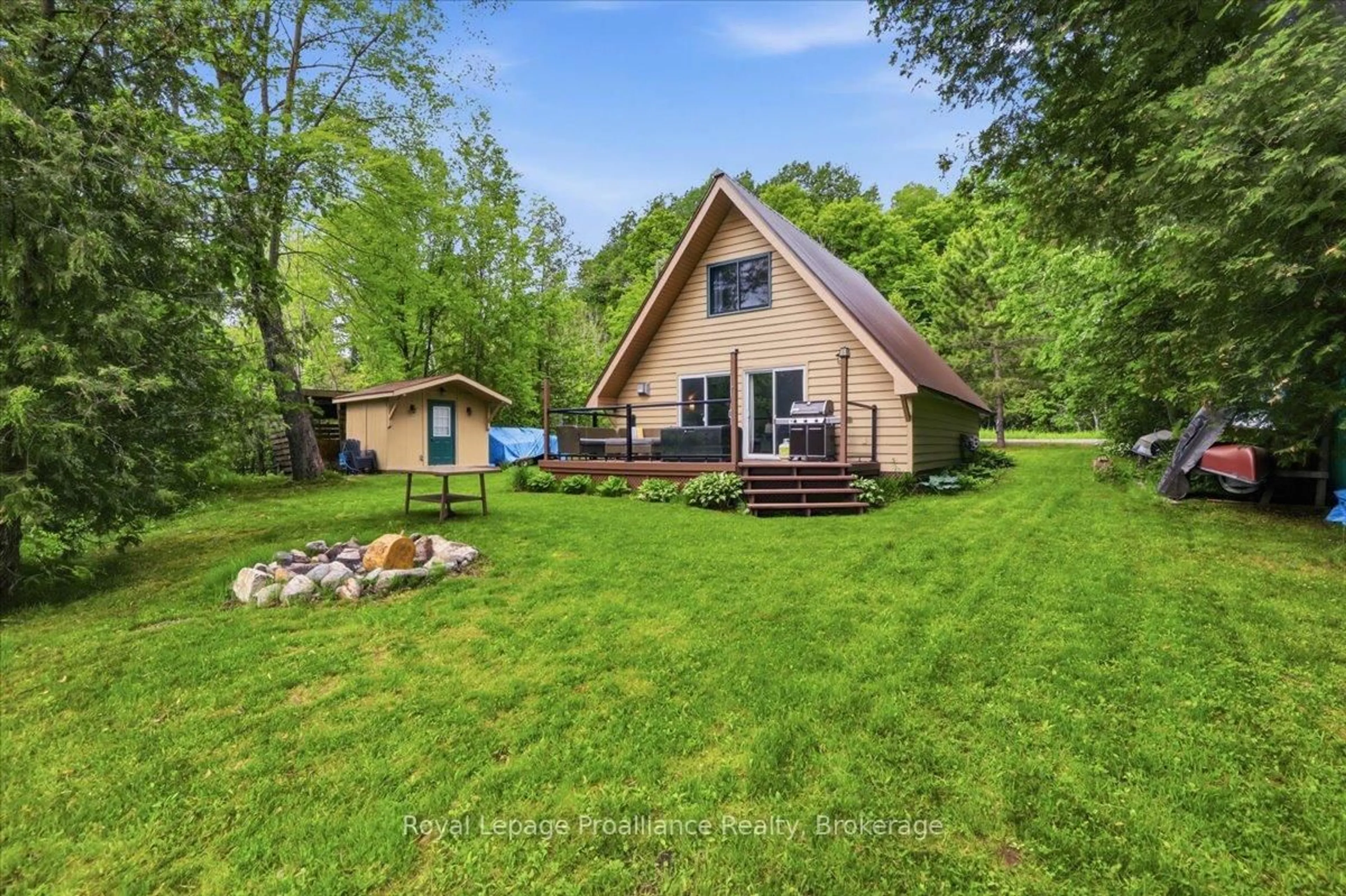 A pic from outside/outdoor area/front of a property/back of a property/a pic from drone, water/lake/river/ocean view for 1062 Price Rd, Frontenac Ontario K0H 0B6