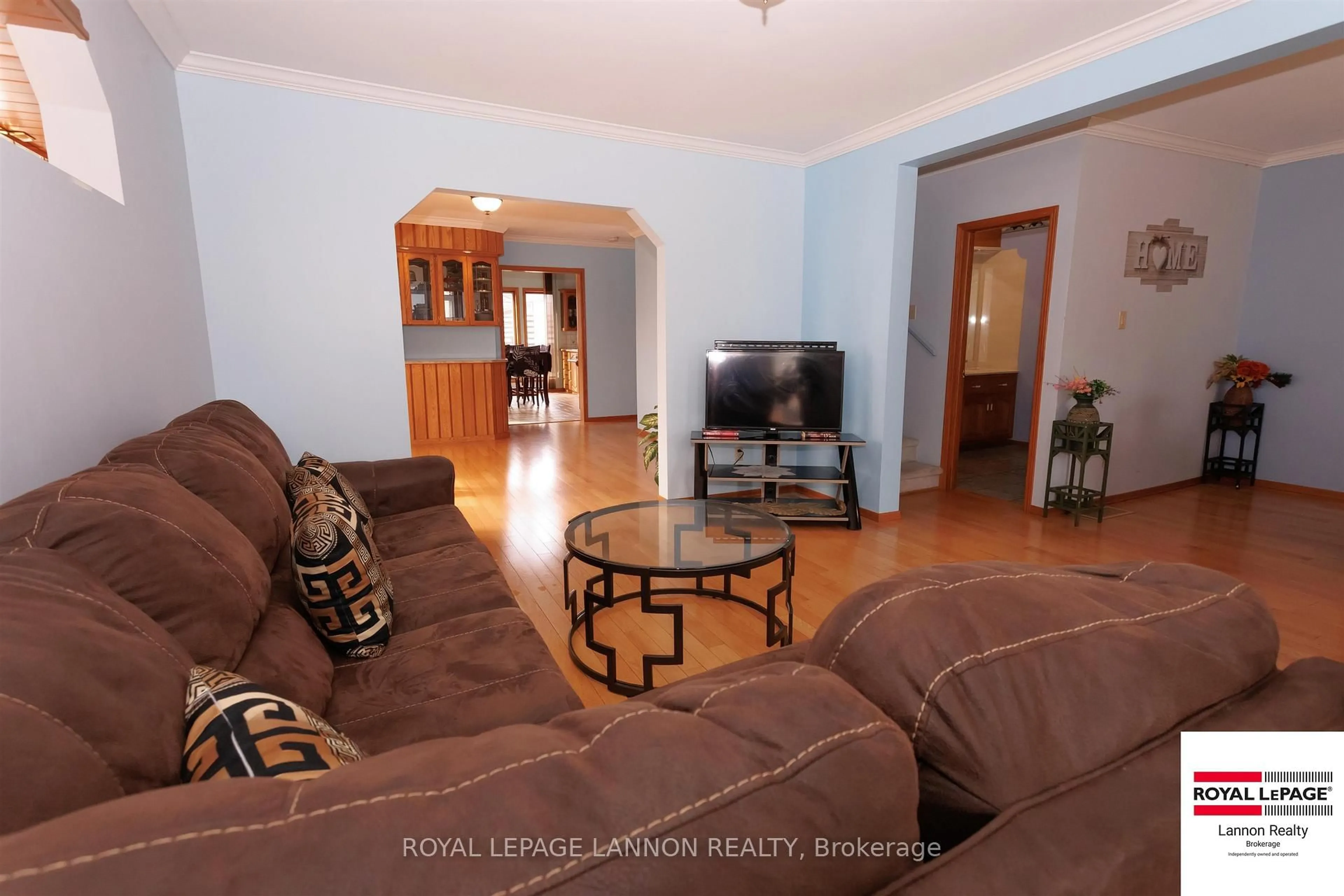 Living room with furniture, wood/laminate floor for 88 Carl Ave, Thunder Bay Ontario P7B 4Z5