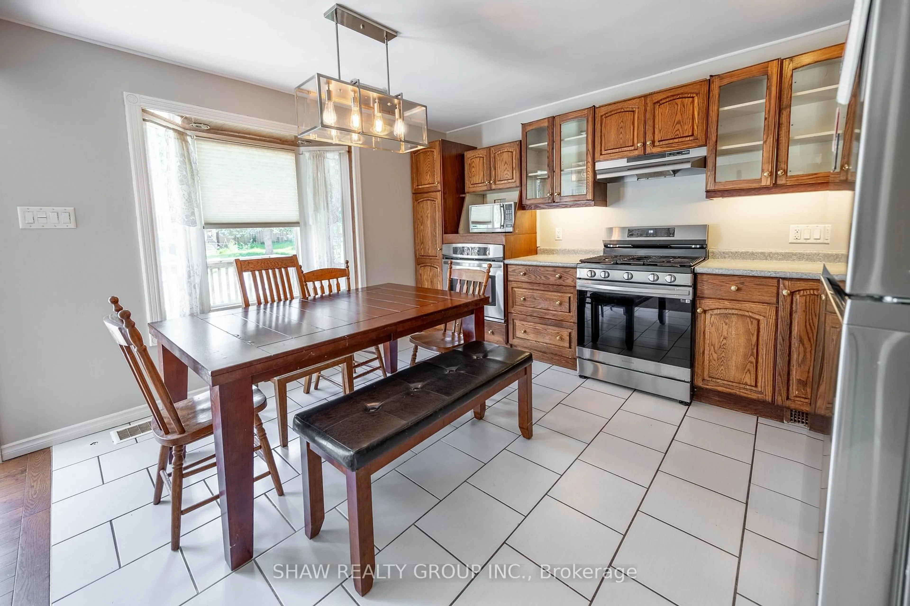 Open concept kitchen, ceramic/tile floor for 690 Guelph St, Kitchener Ontario N2H 5Y9