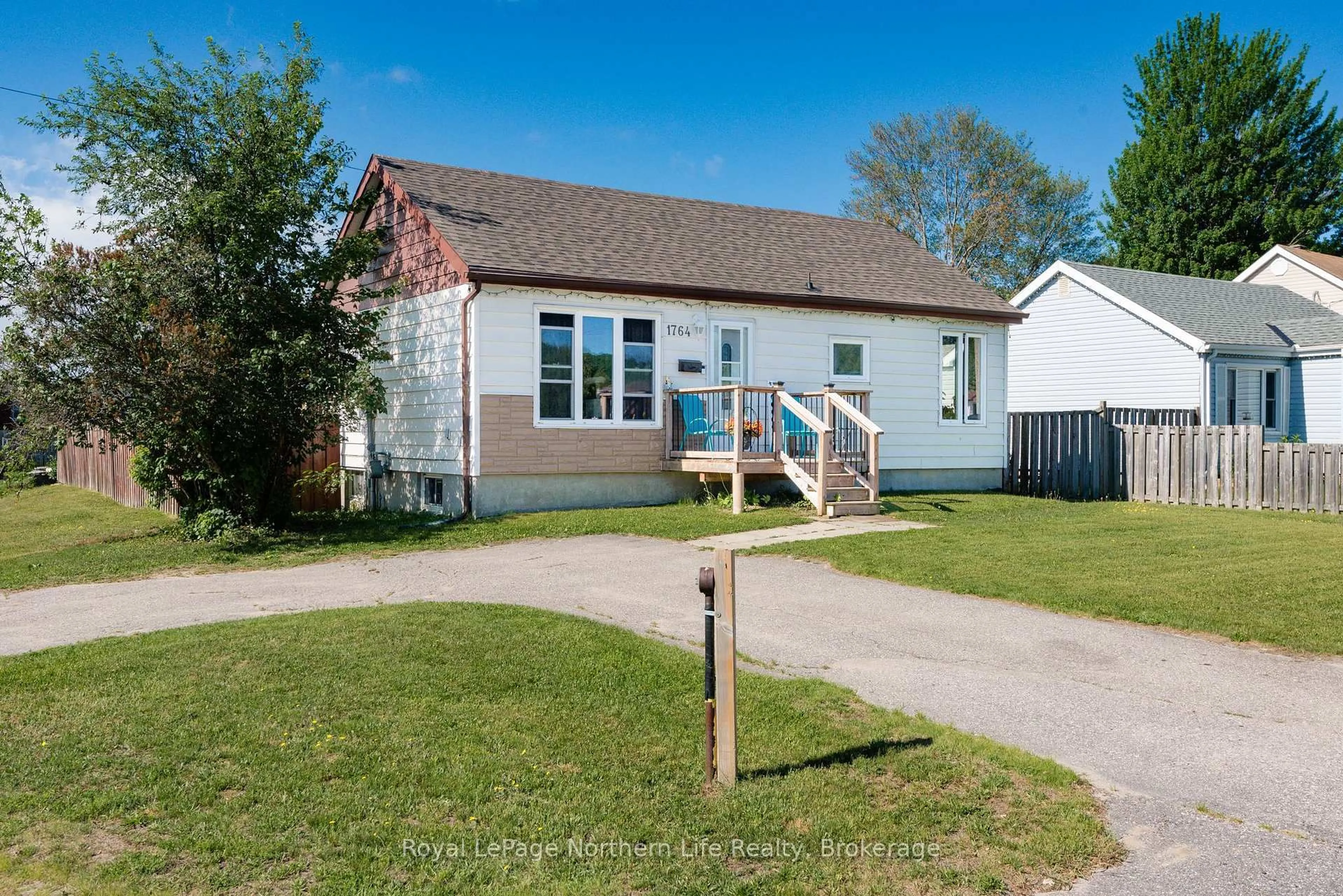 Home with vinyl exterior material, street for 1764 Mckeown Ave, North Bay Ontario P1B 7N3