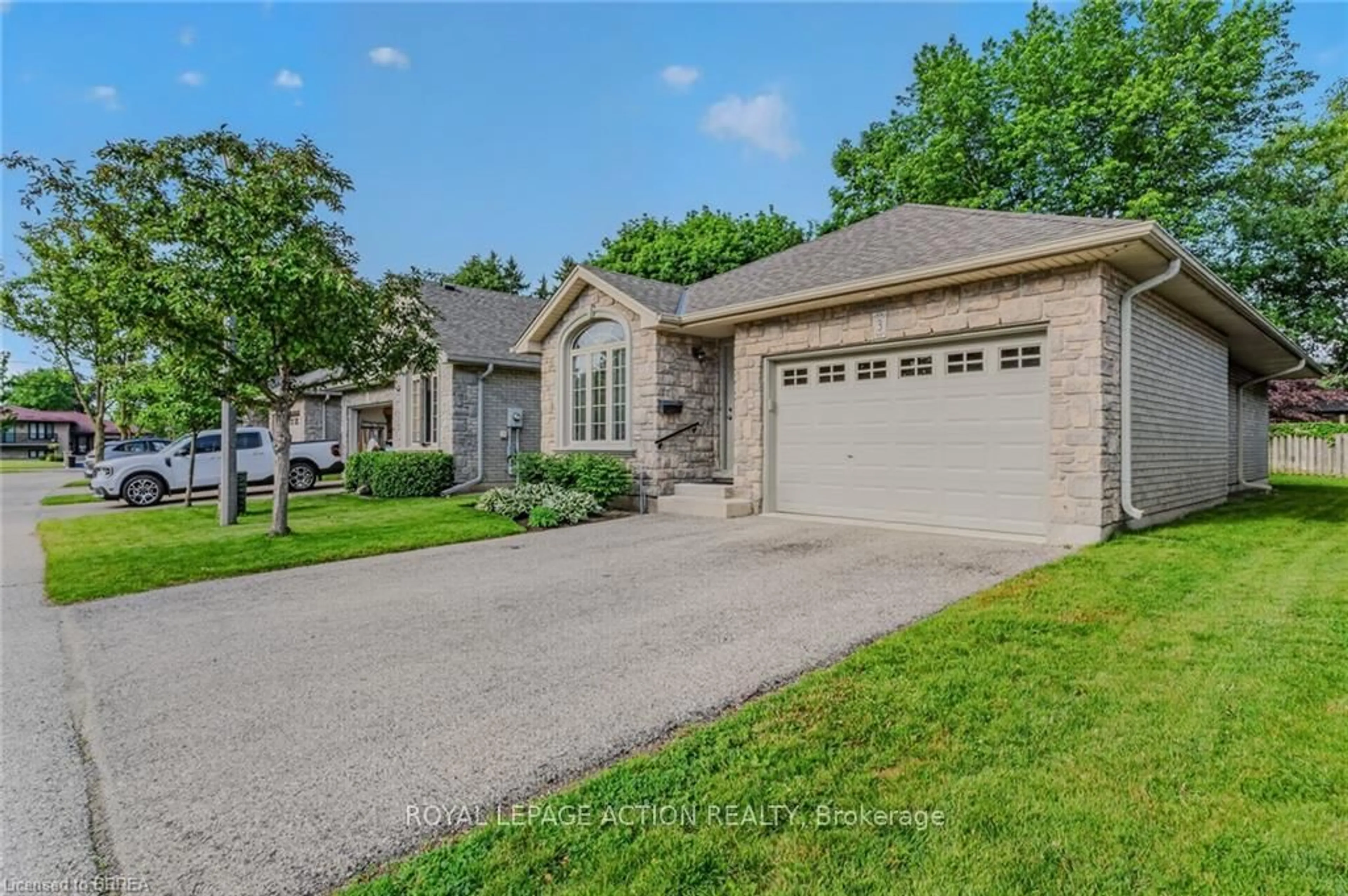 Home with brick exterior material, street for 54 Glenwood Dr #3, Brantford Ontario N3S 3G6
