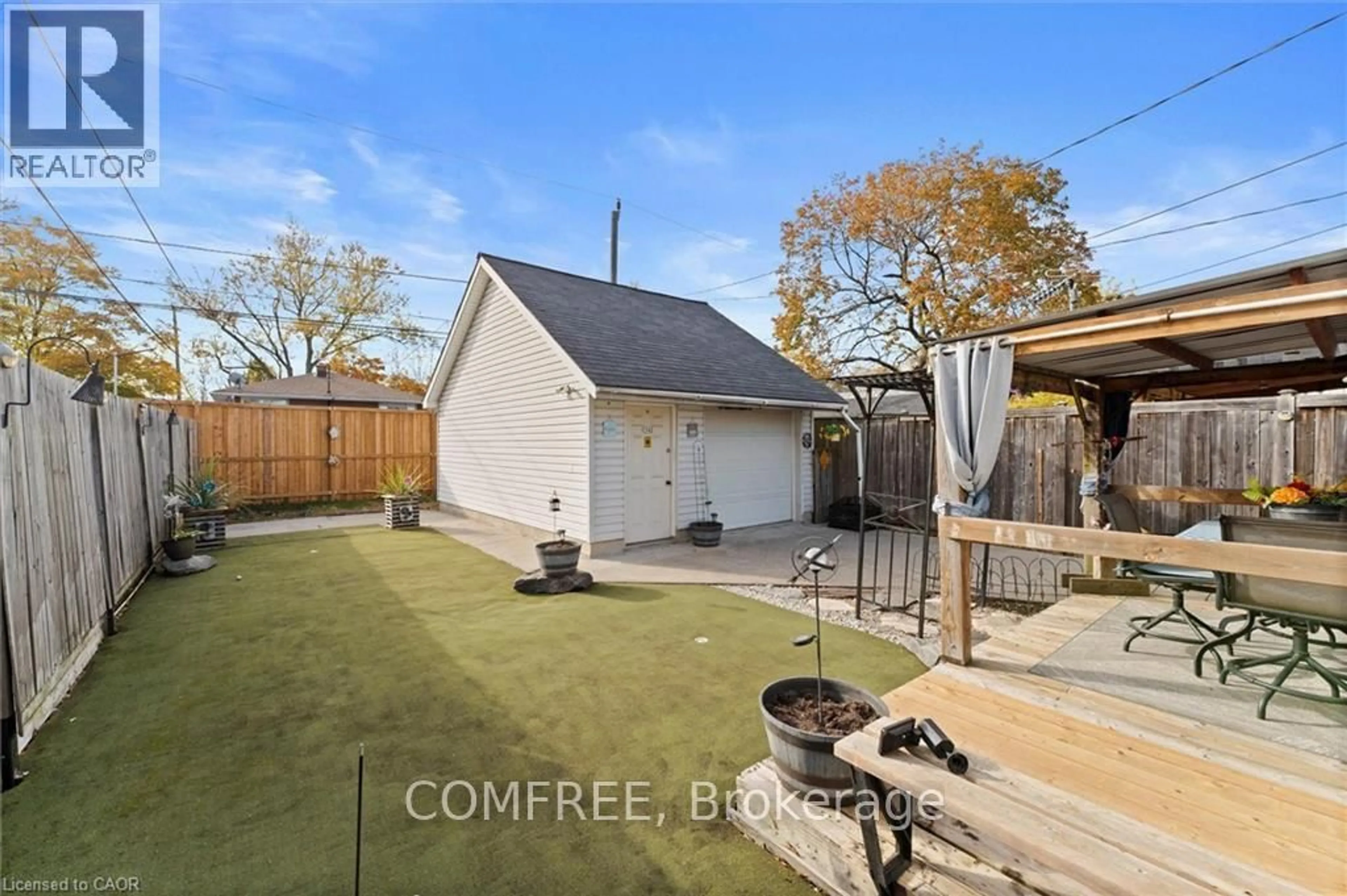 A pic from outside/outdoor area/front of a property/back of a property/a pic from drone, street for 1743 St Luke Rd, Out of Area Ontario N8Y 3N7