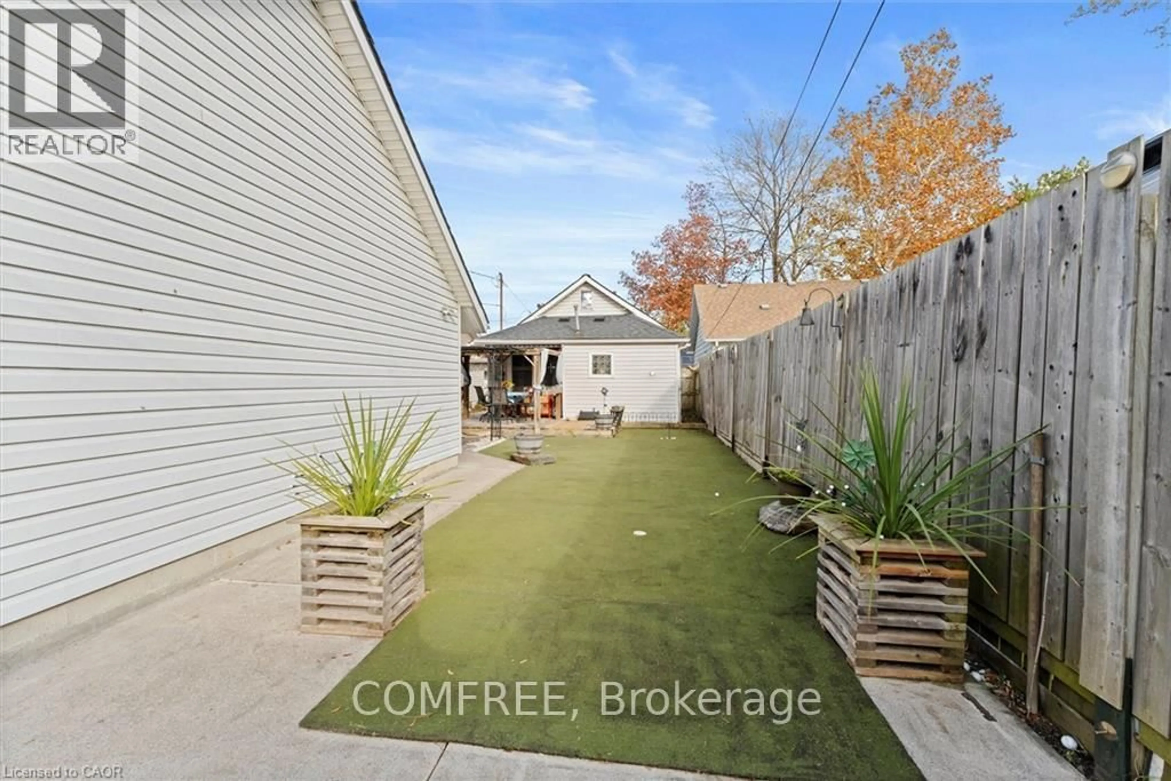 A pic from outside/outdoor area/front of a property/back of a property/a pic from drone, street for 1743 St Luke Rd, Out of Area Ontario N8Y 3N7